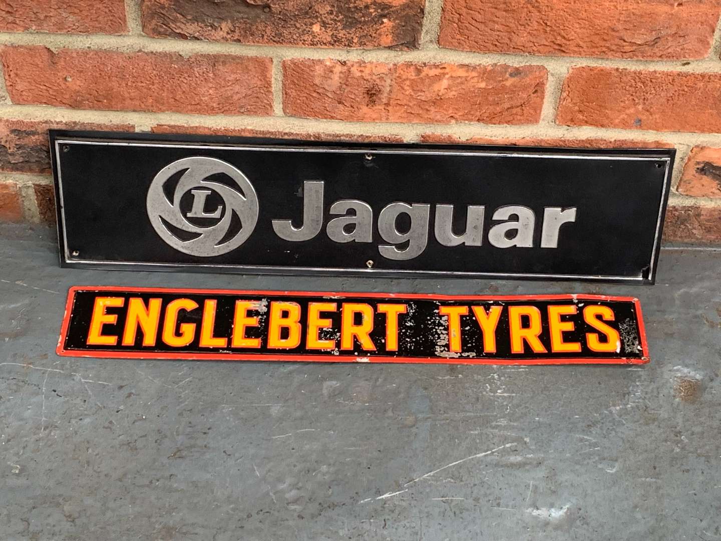 <p>Tin Englebert Tyres Sign and Platic Jaguar Sign (2)</p>