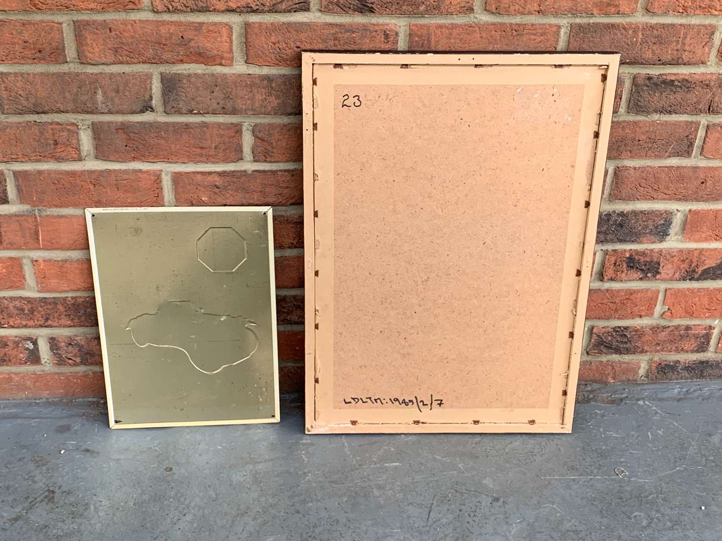 <p>Modern Tin MG Sign and Framed Lucas Print (2)</p>