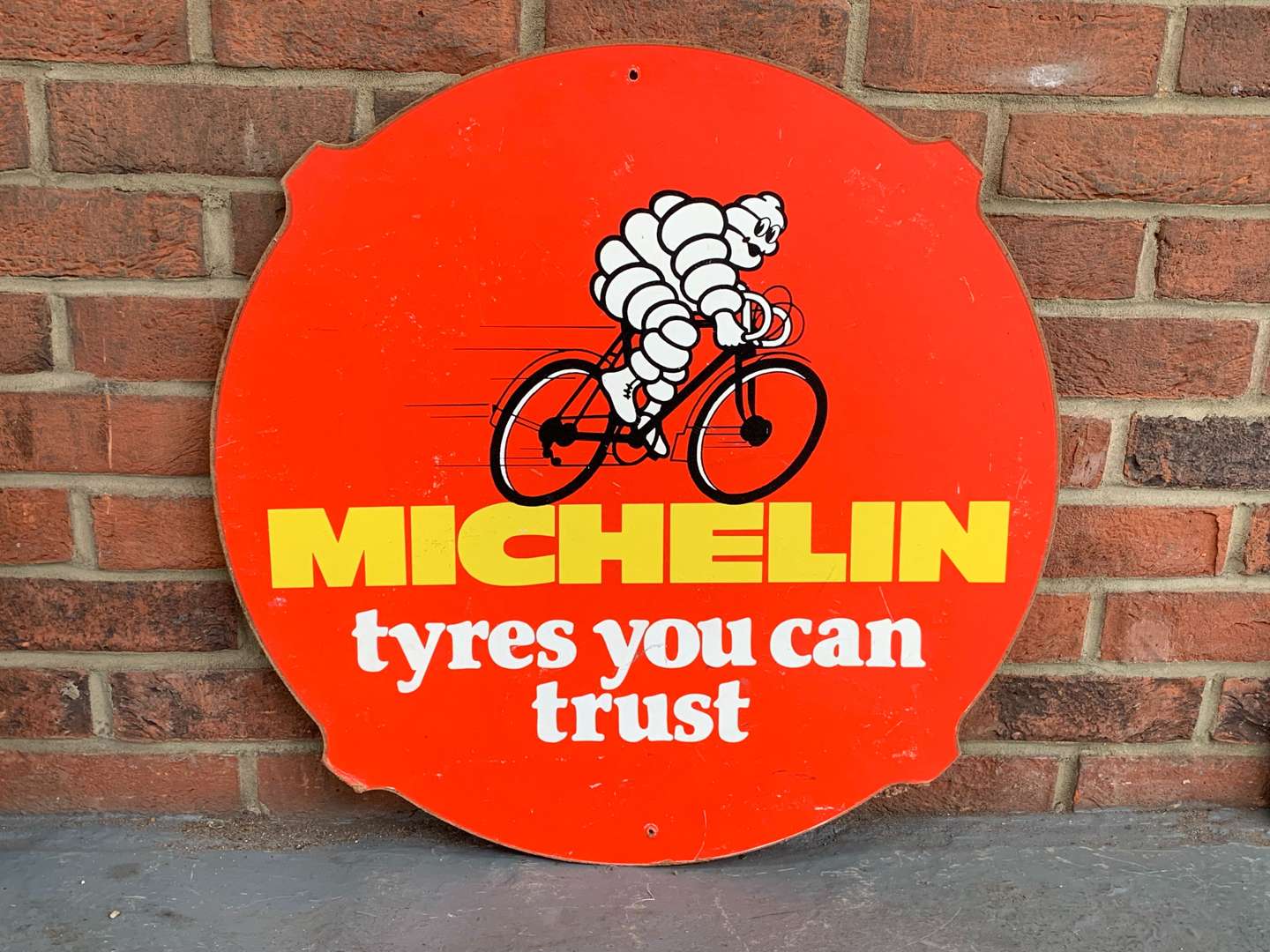 <p>Michelin Cycles “Tyres You Can Trust” Sign on Board</p>