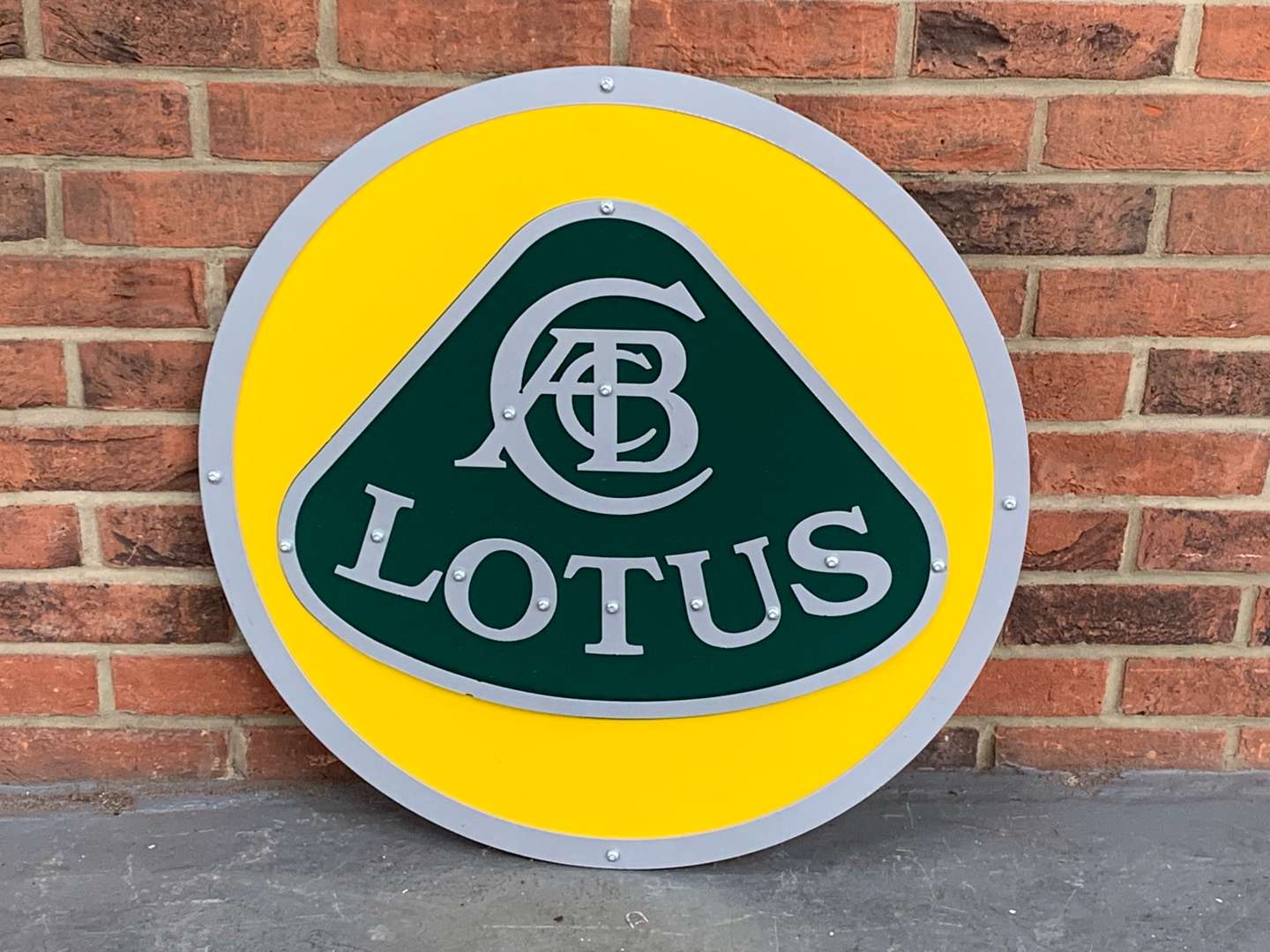 <p>Metal Lotus Dealership Display Sign</p>