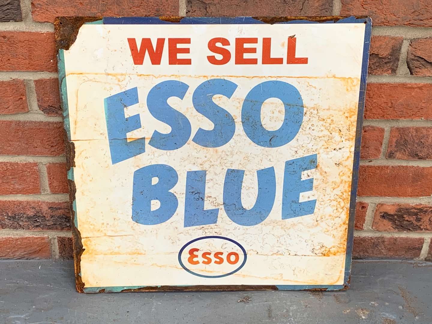 <p>Metal “We Sell Esso Blue” Sign</p>