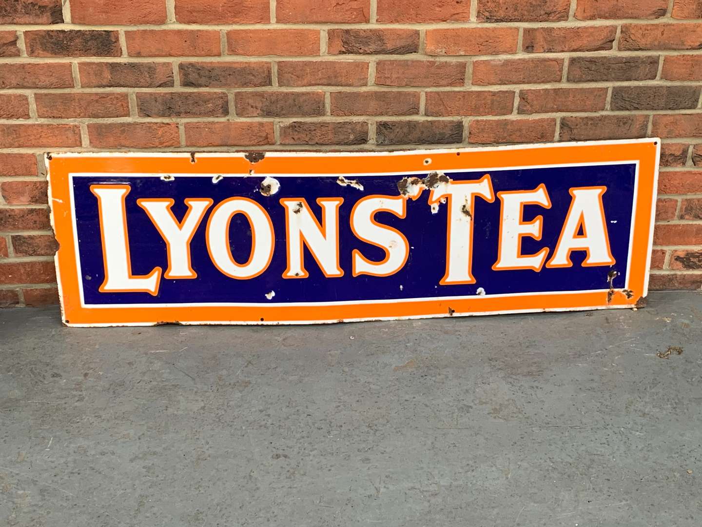 <p>Enamel Lyons Tea Sign</p>