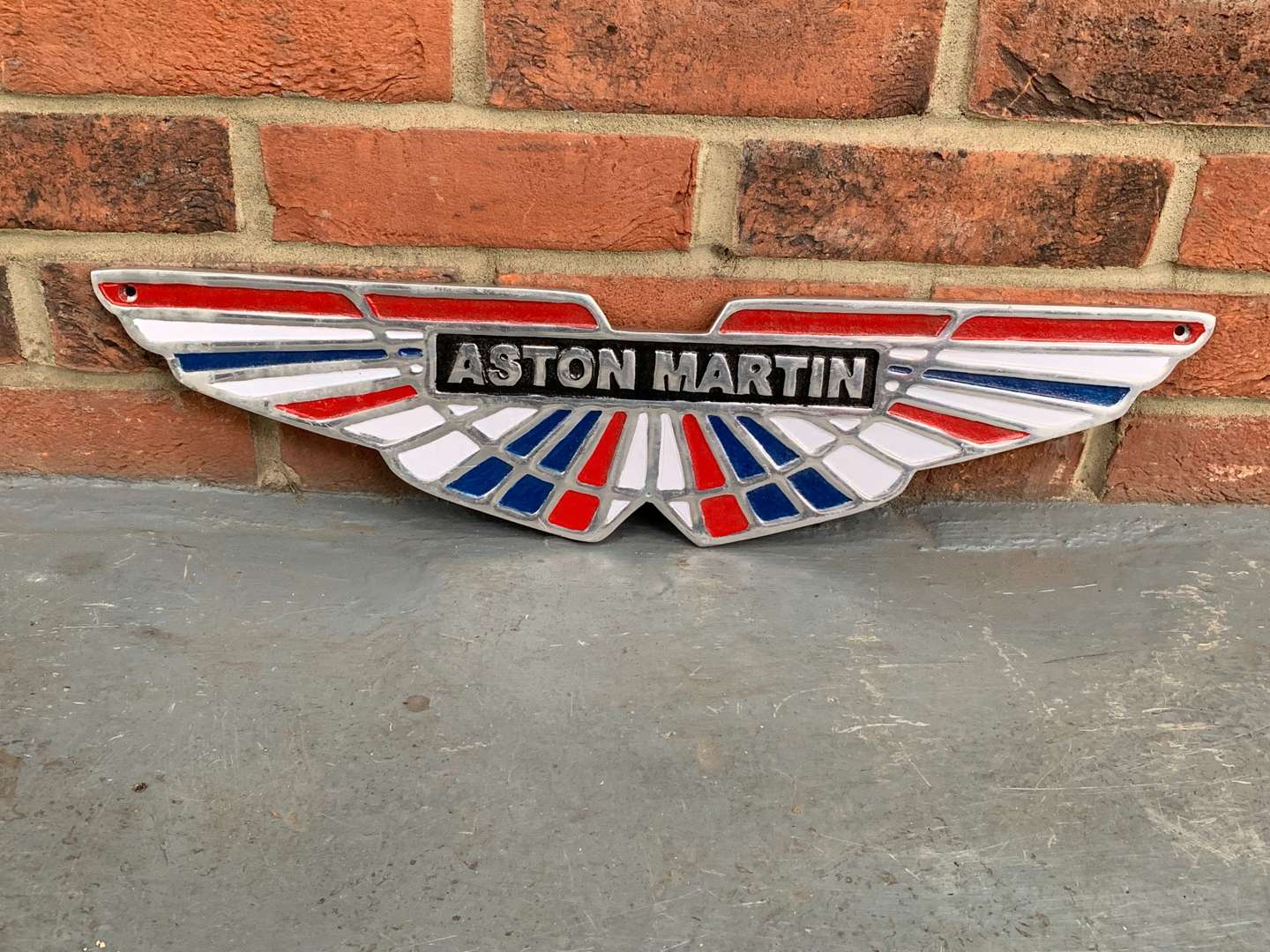 <p>Cast Aluminium Aston Martin Emblem Sign</p>