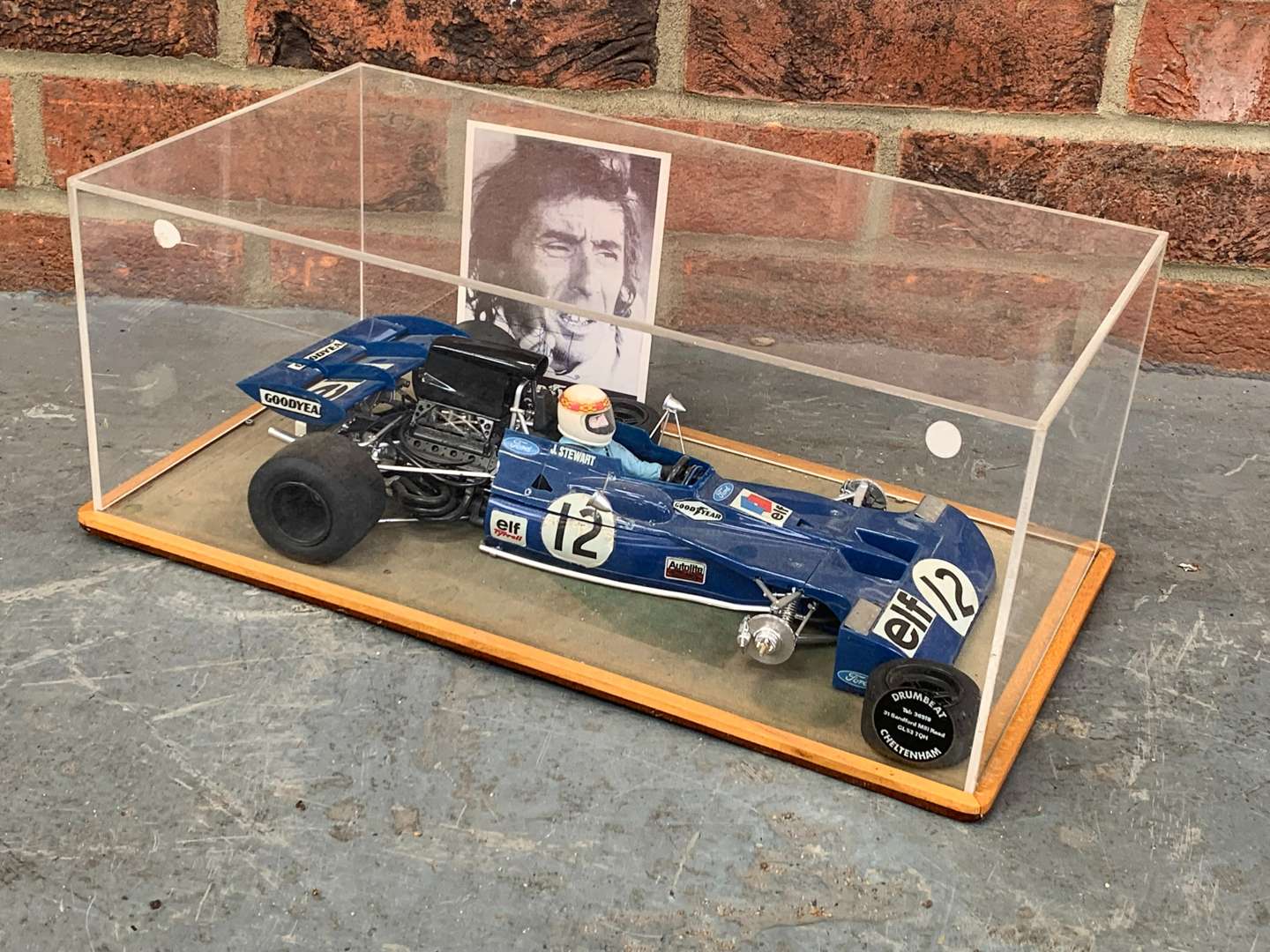 <p>Cased ELF F1 Racing Car Model and Signed J Stewart Photo</p>