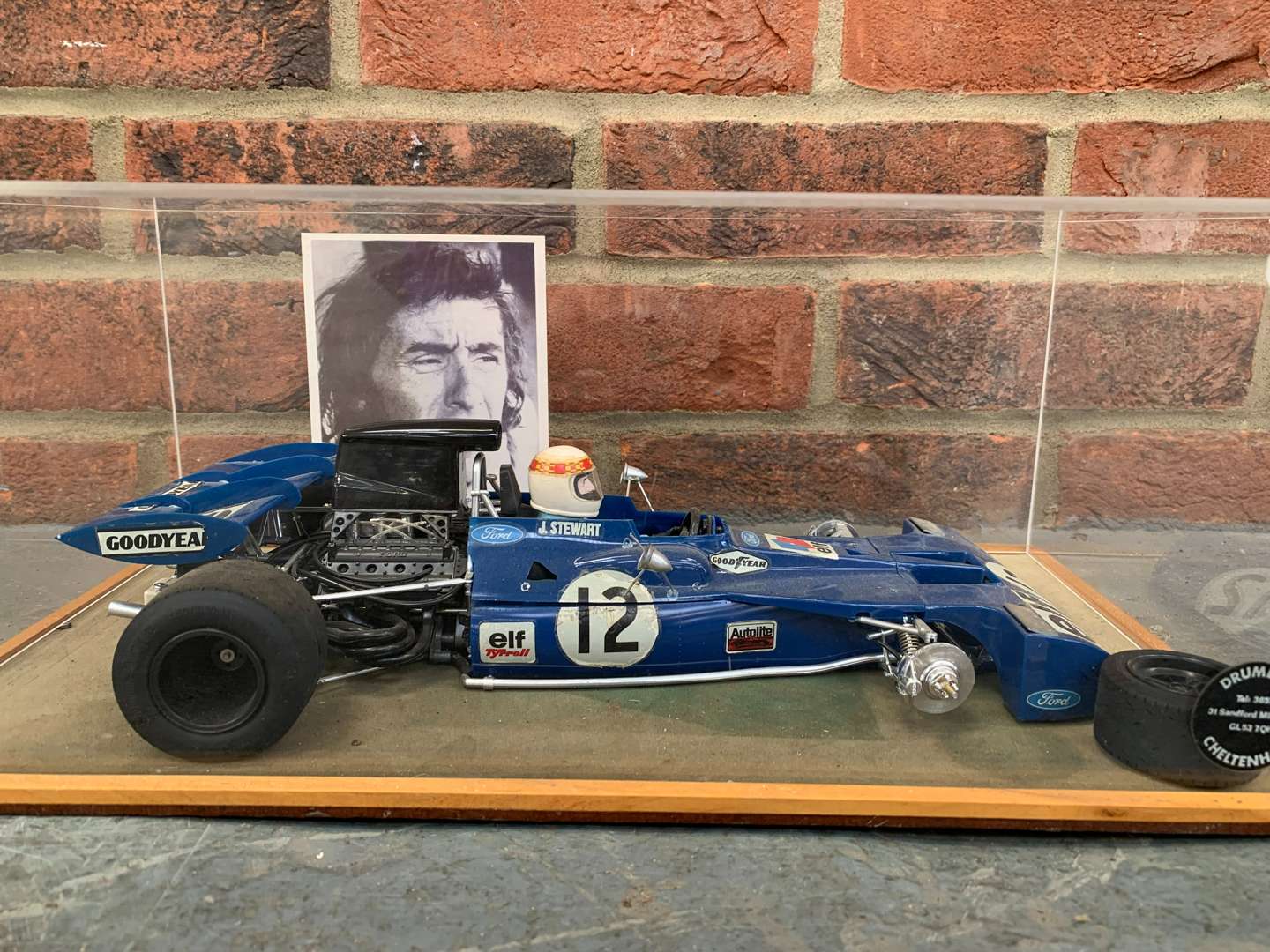 <p>Cased ELF F1 Racing Car Model and Signed J Stewart Photo</p>