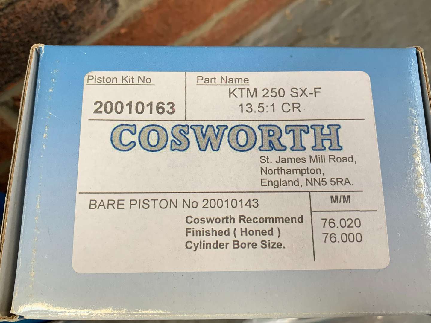<p>Box of Ford Cosworth Pistons</p>
