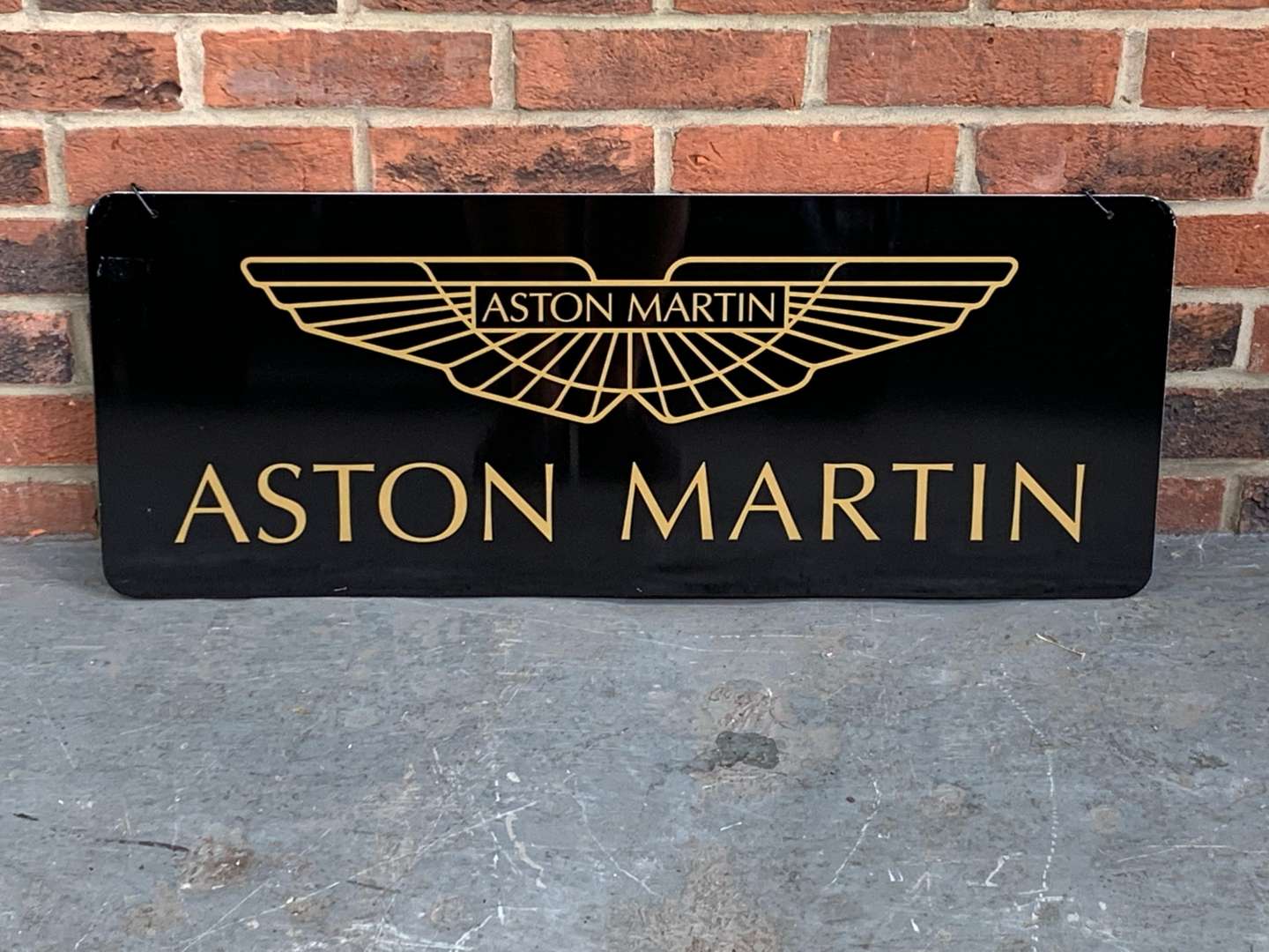 <p>Modern Metal Aston Martin Hanging Sign</p>