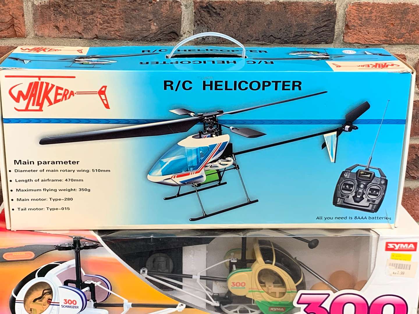<p>Two Boxed Remote Controlled Helicopters&nbsp;</p>