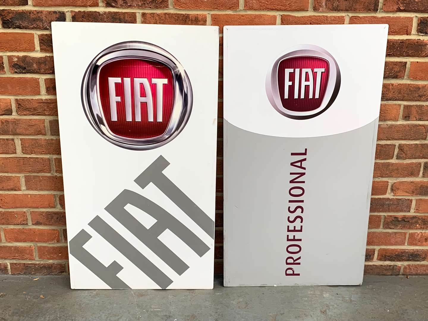 <p>Two Fiat Dealership Signs</p>