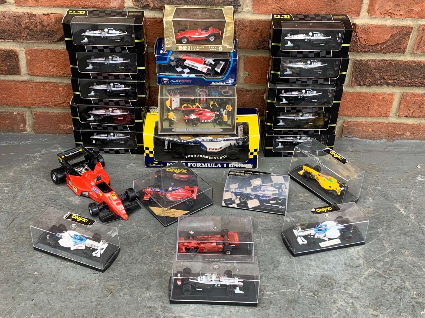 <p>Quantity of Boxed F1 Die Cast Cars</p>
