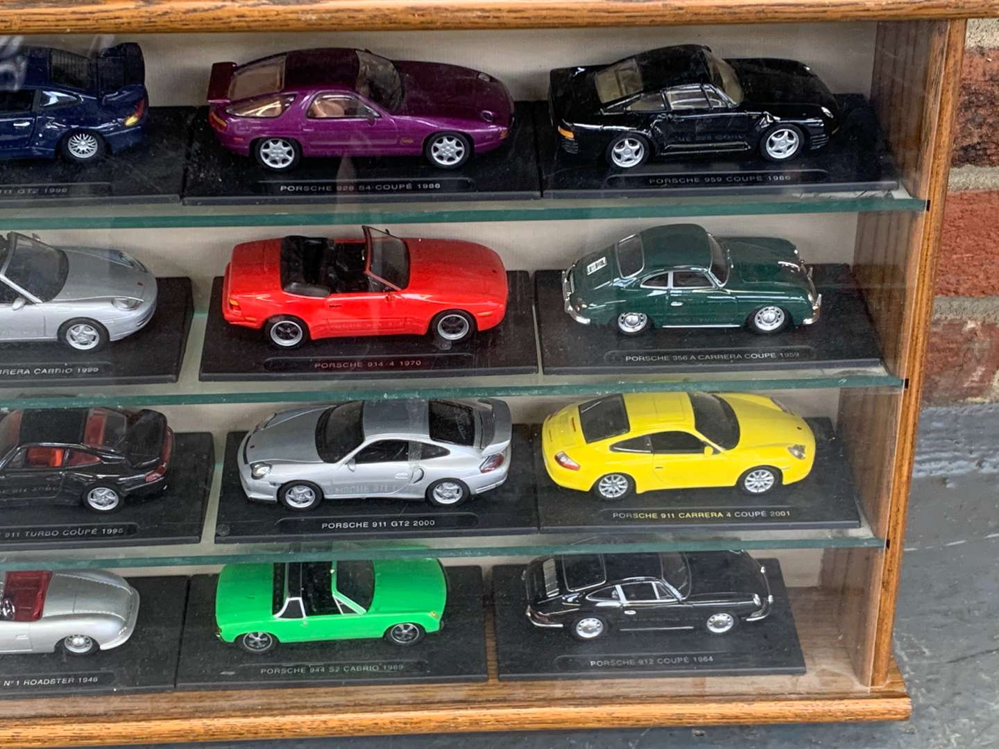 <p>Display Case of Porsche Die Cast Model&nbsp;</p>