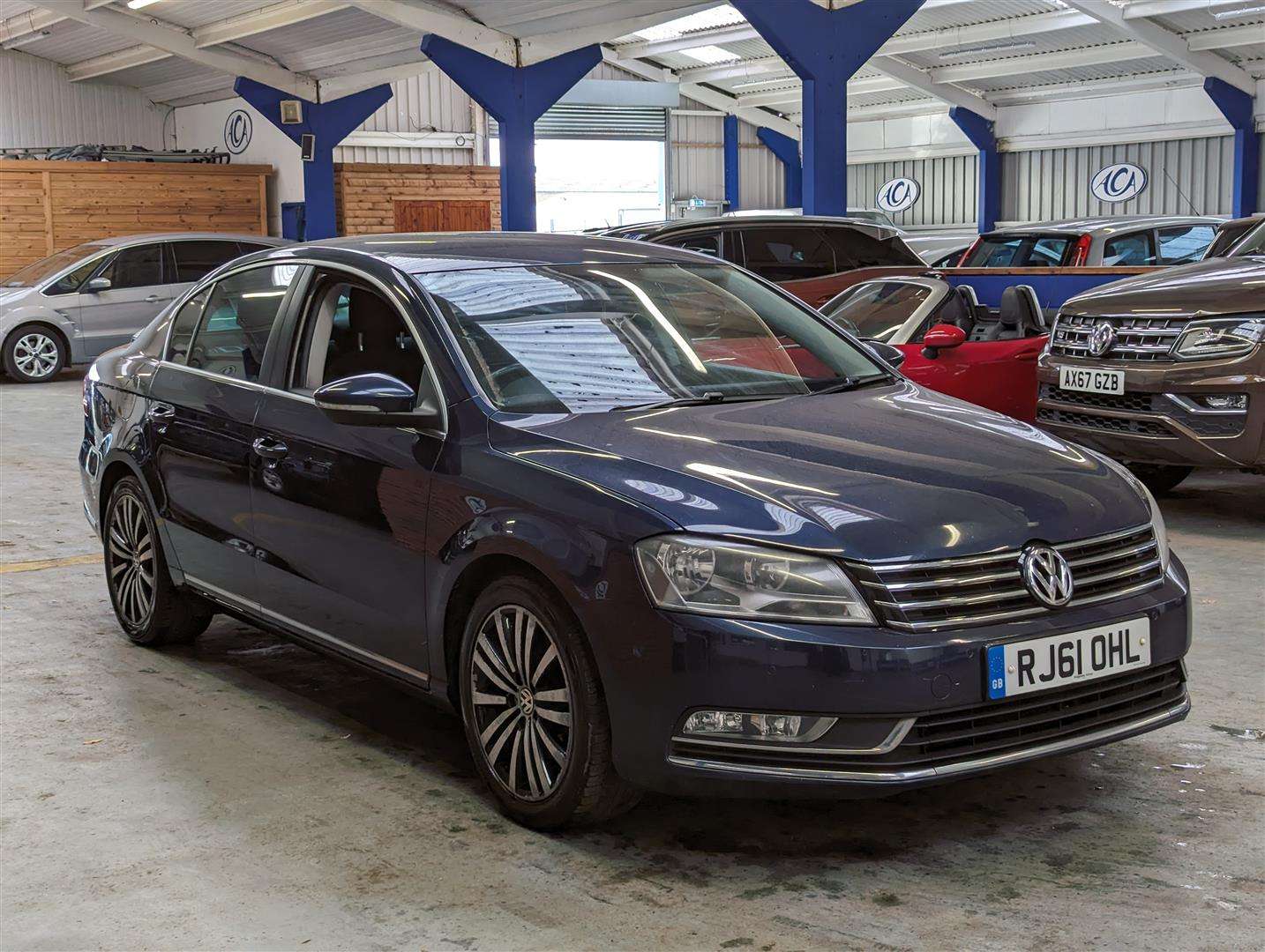 <p>2011 VOLKSWAGEN PASSAT SPORT BLUEMOTN TEC</p>