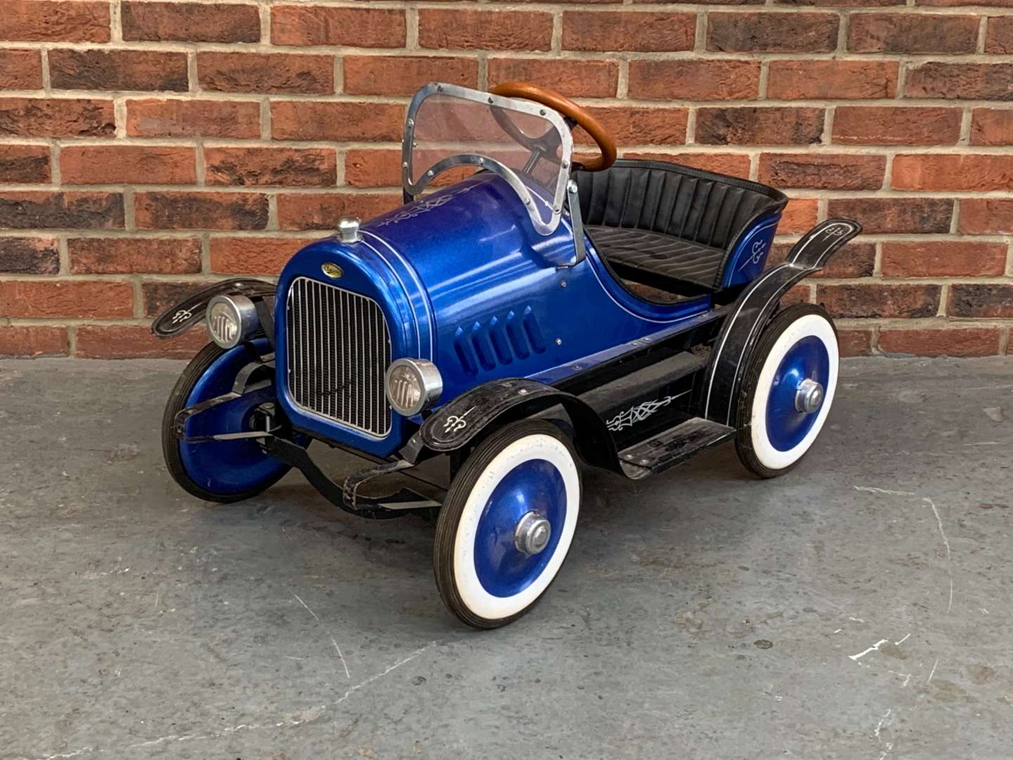 <p>Tin Plate Childs Pedal Car</p>