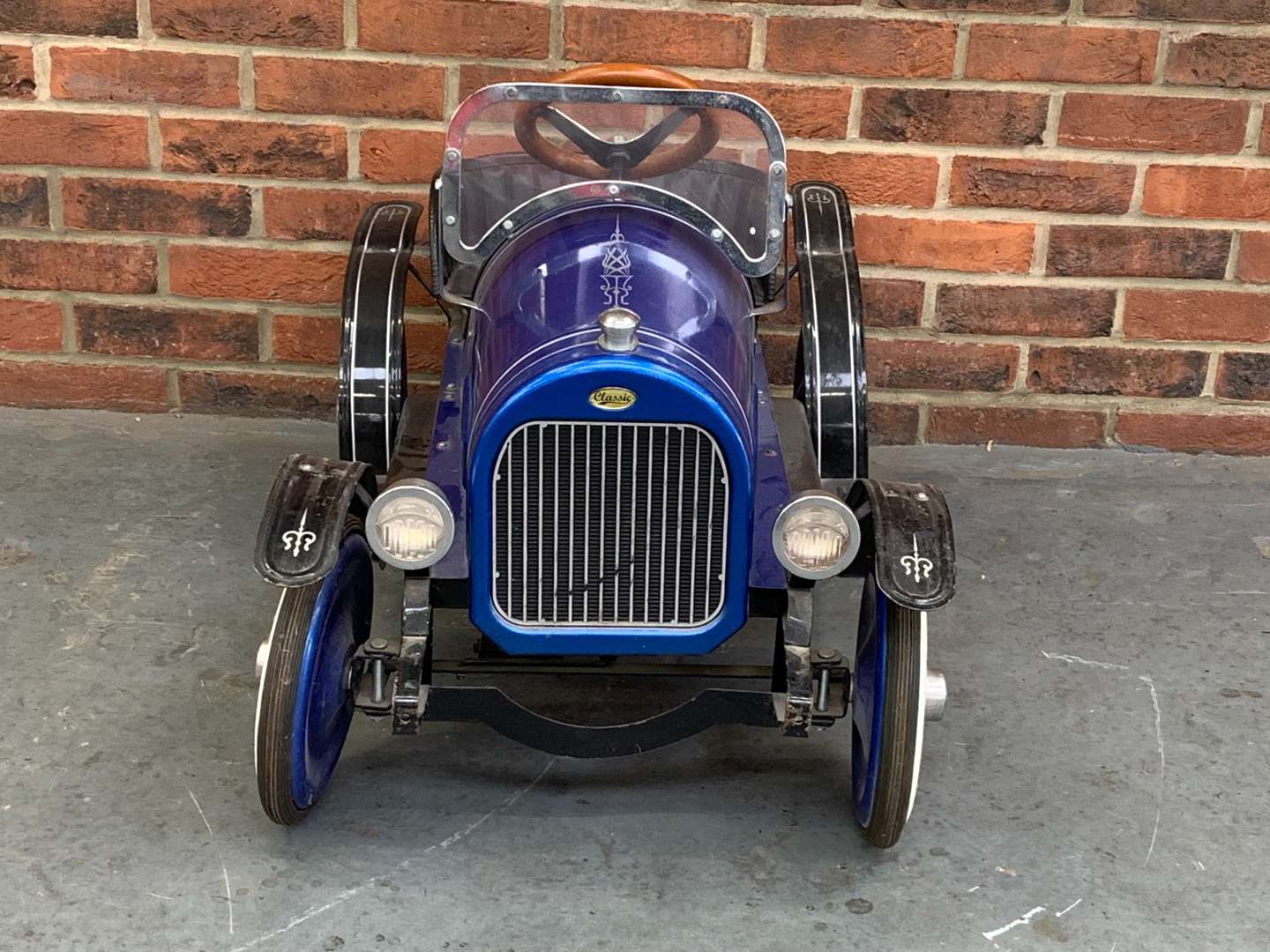 <p>Tin Plate Childs Pedal Car</p>