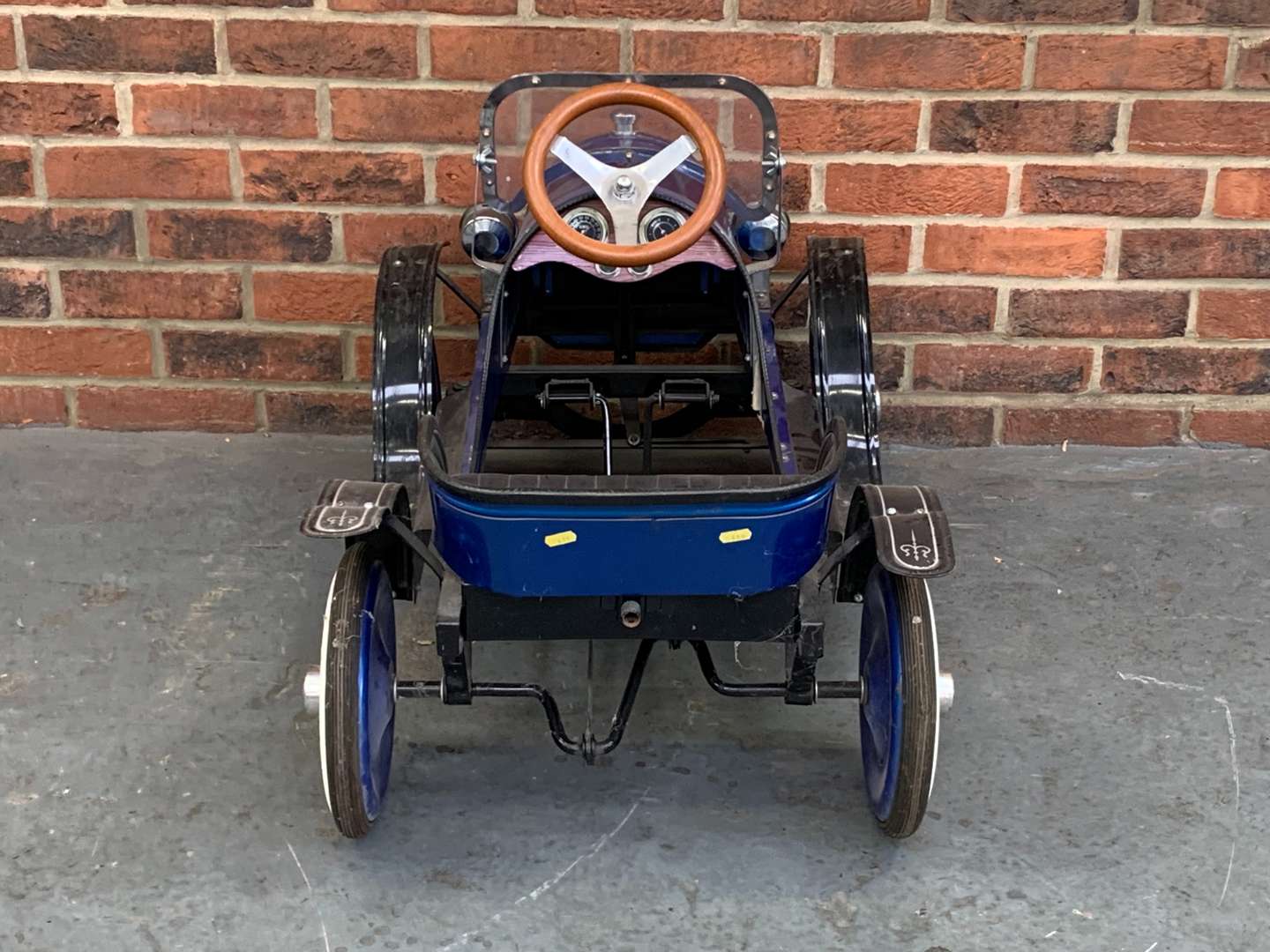 <p>Tin Plate Childs Pedal Car</p>