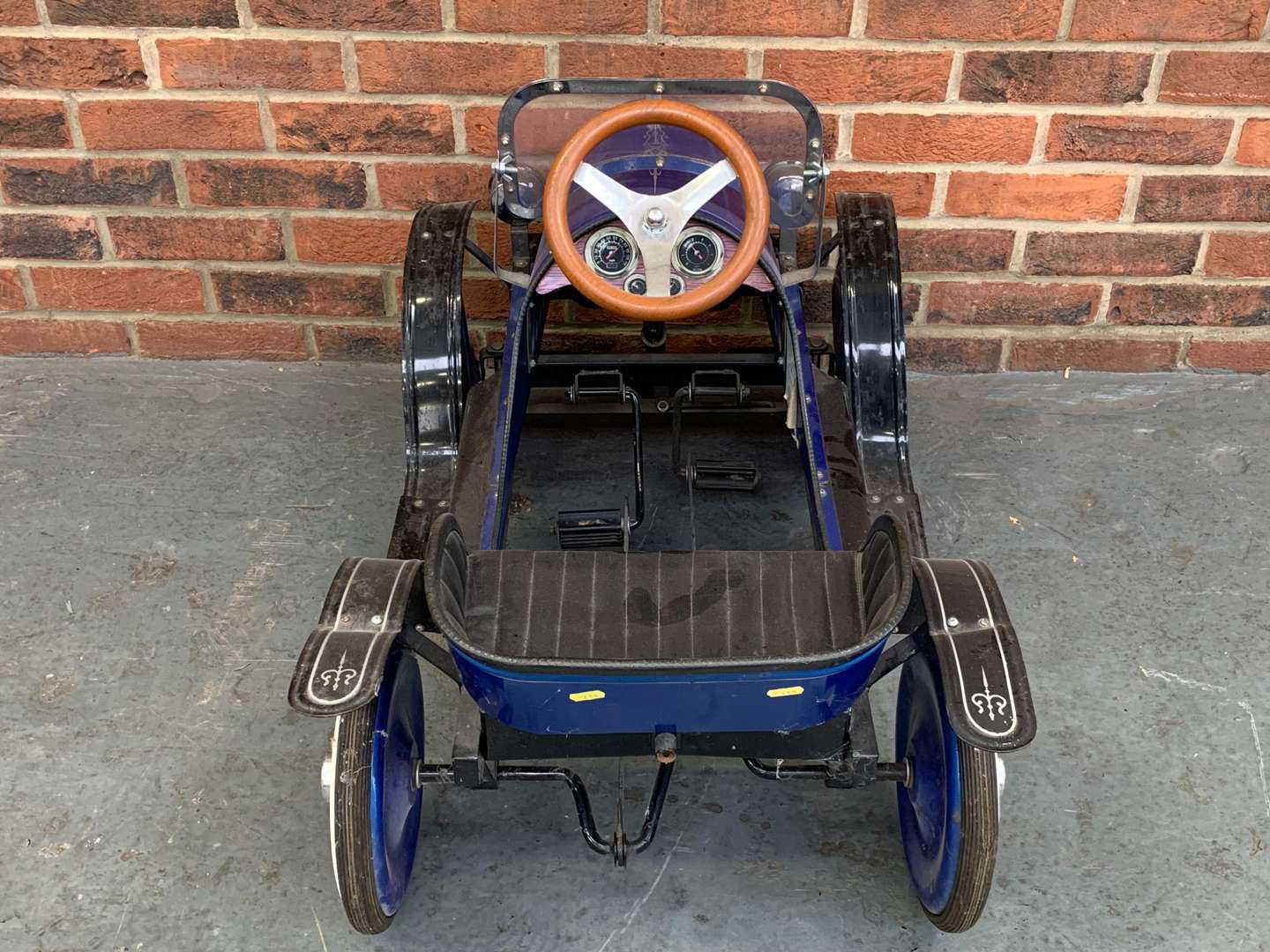 <p>Tin Plate Childs Pedal Car</p>