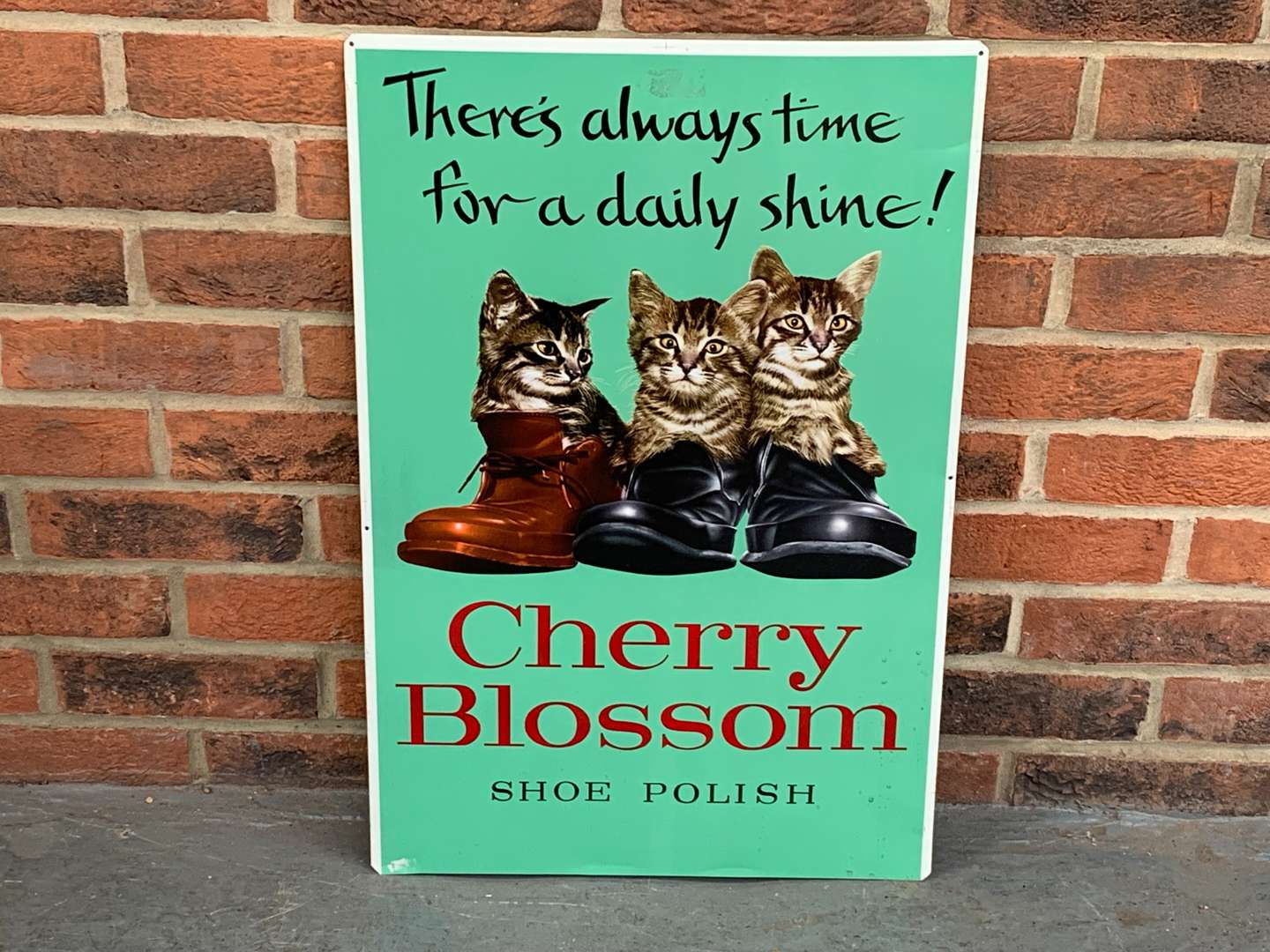 <p>Tin Cherry Blossom Shoe Polish Sign</p>