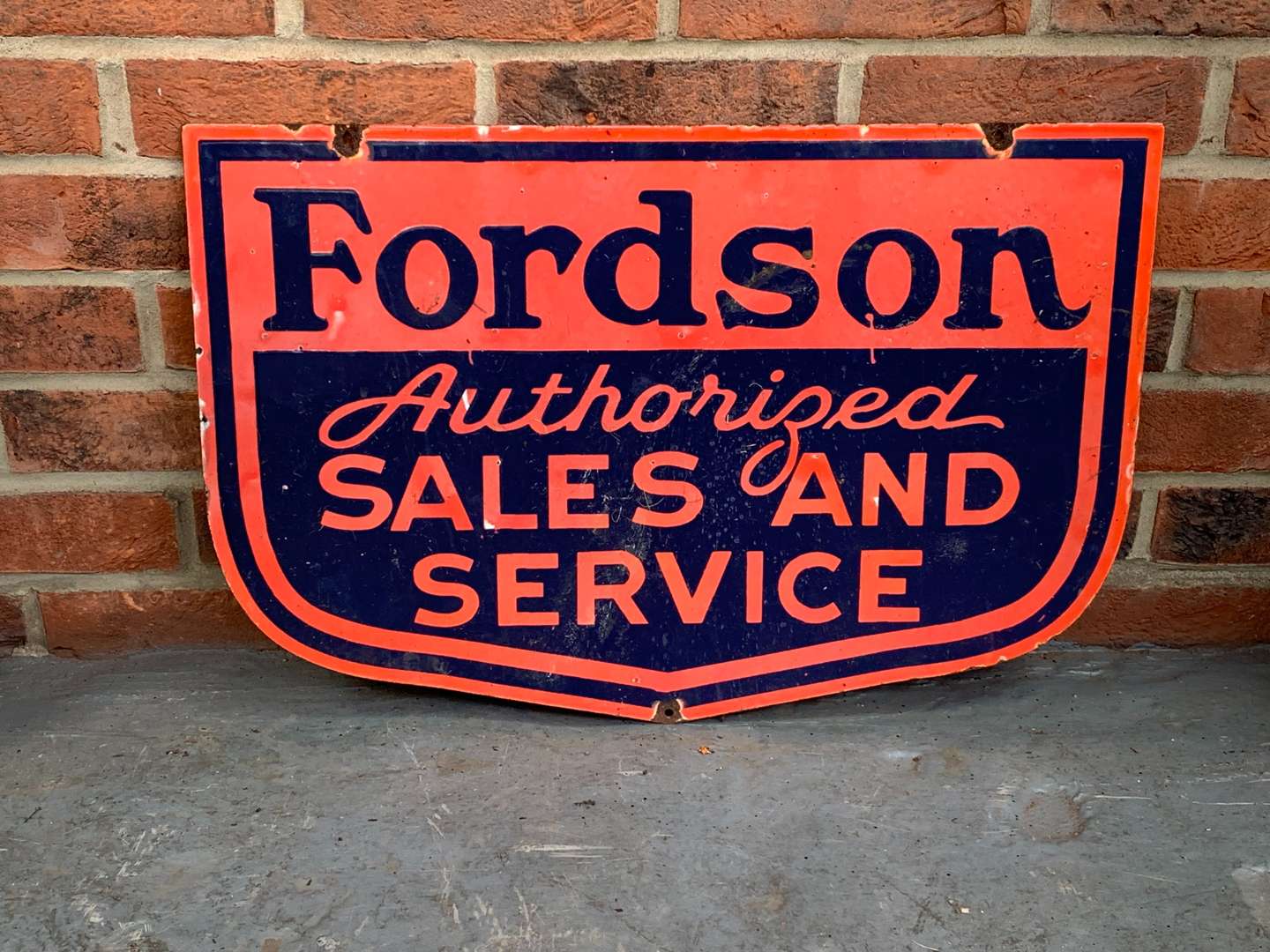 <p>Fordson Sales and Service Enamel Sign</p>