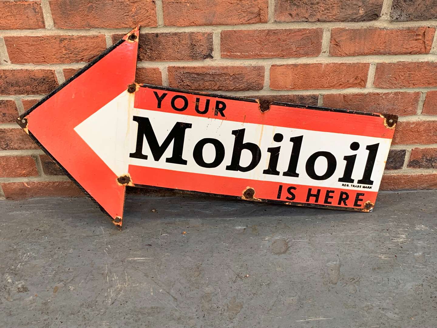 <p>Enamel Arrow “Your Mobiloil is Here" Sign</p>