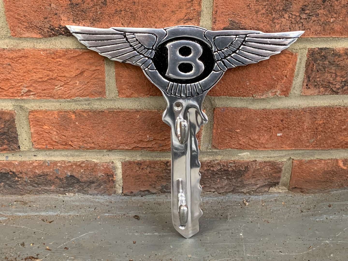 <p>Bentley Emblem Aluminium Coat Hook</p>