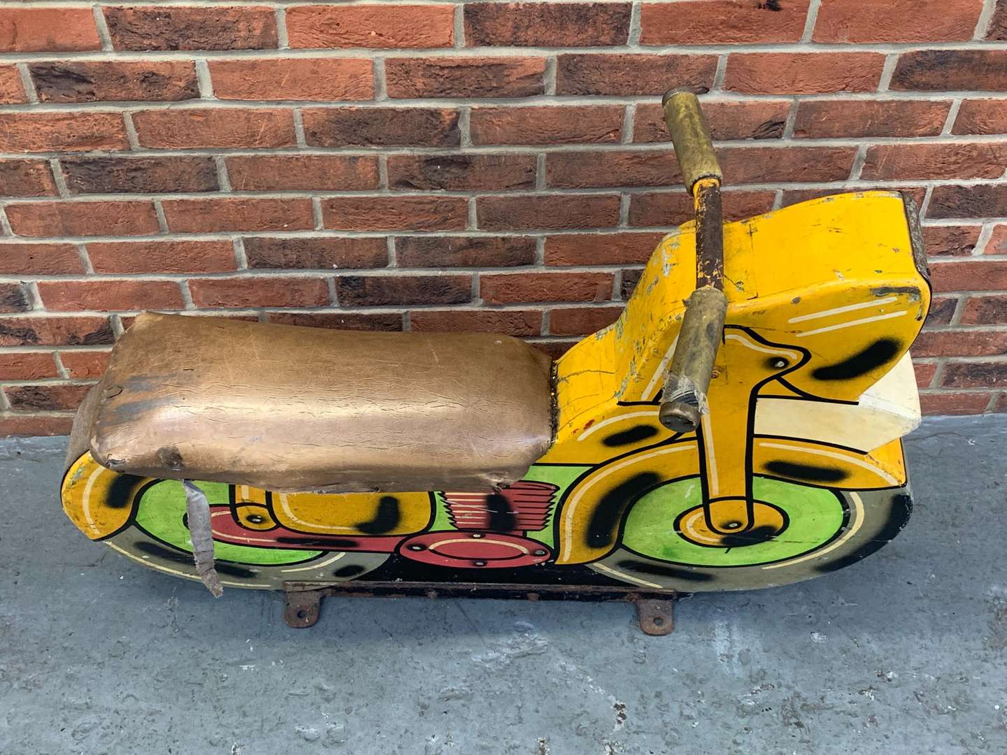 <p>Vintage Wooden Painted Motorcycle Fairground Ride</p>