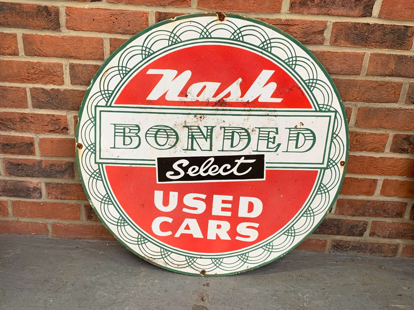 <p>Nash Bonded Used Cars Circular Enamel Sign</p>