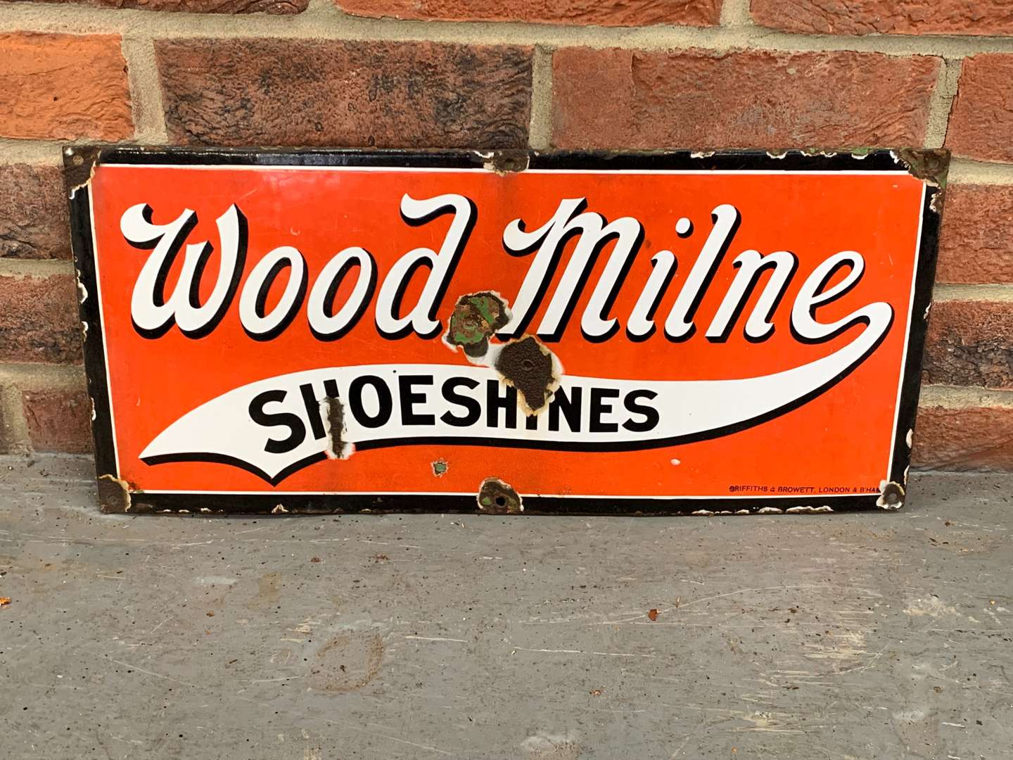 <p>Wood Milne Shoeshine Enamel Sign</p>