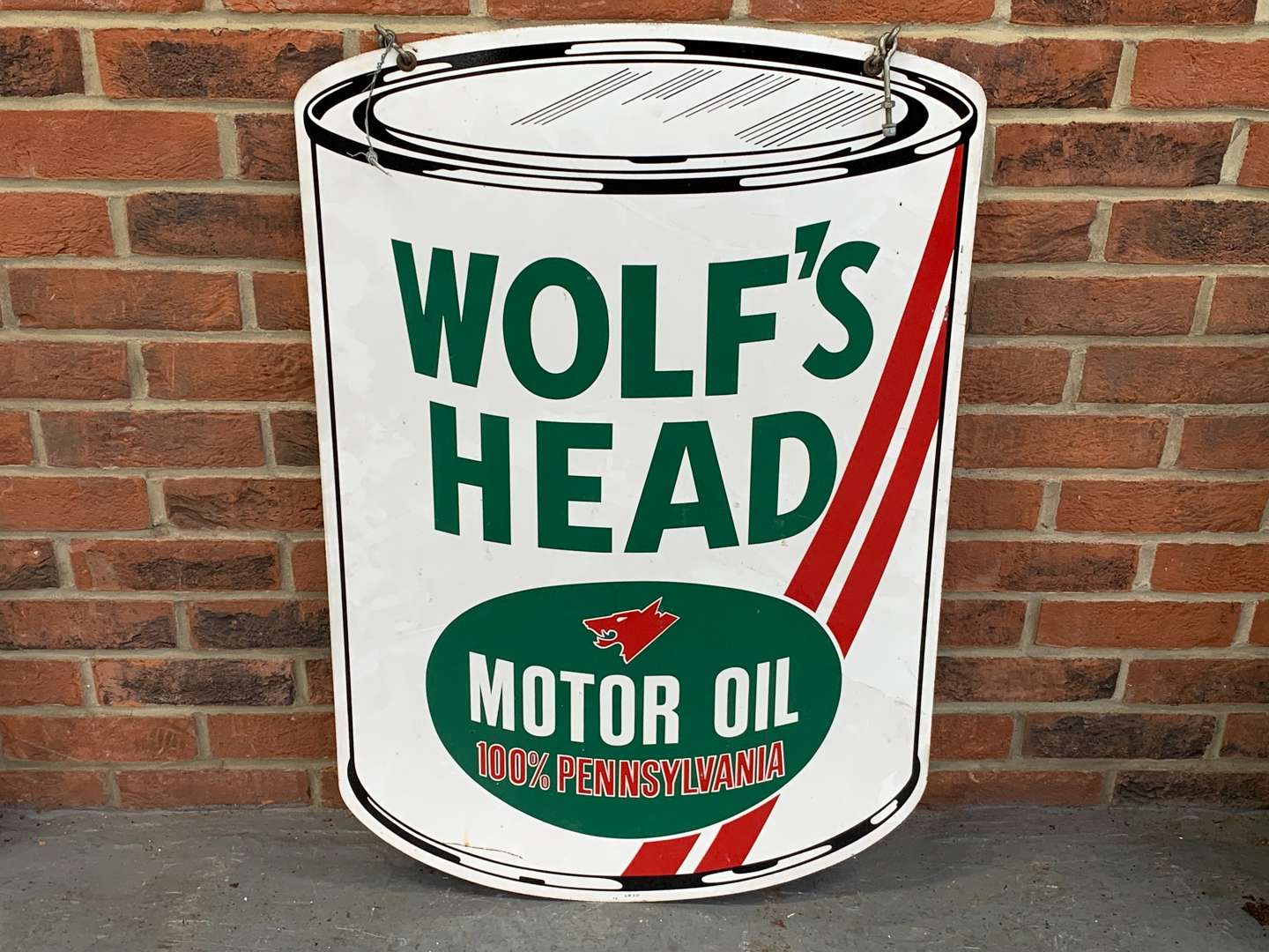 <p>Wolfs Head Motor Oil Can Sign</p>