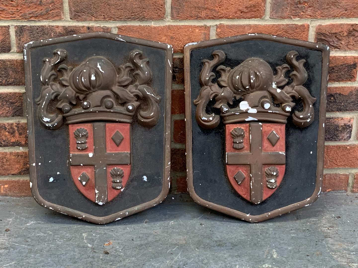 <p>Pair of Plaster Heraldic Crests a/f</p>