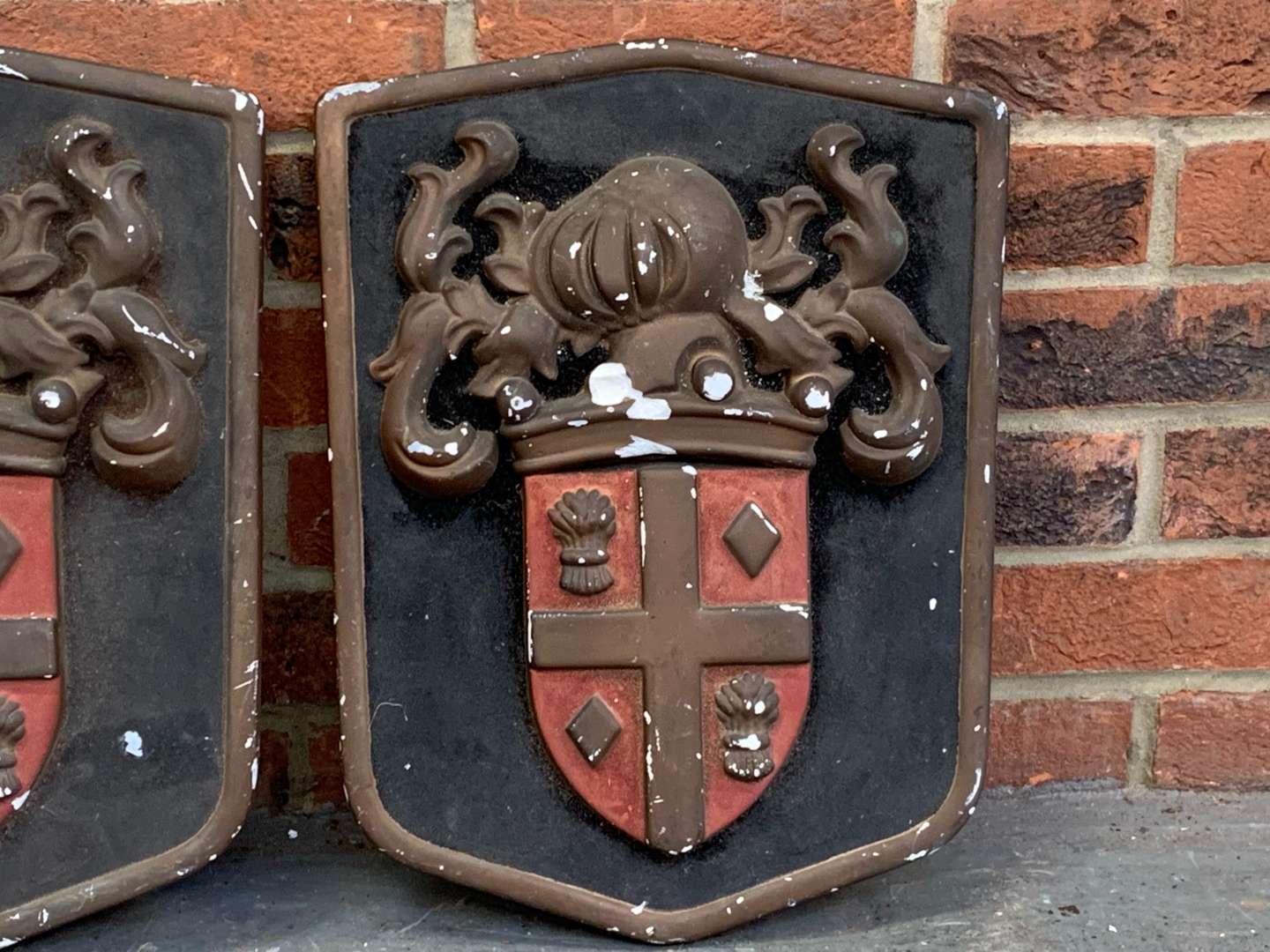 <p>Pair of Plaster Heraldic Crests a/f</p>