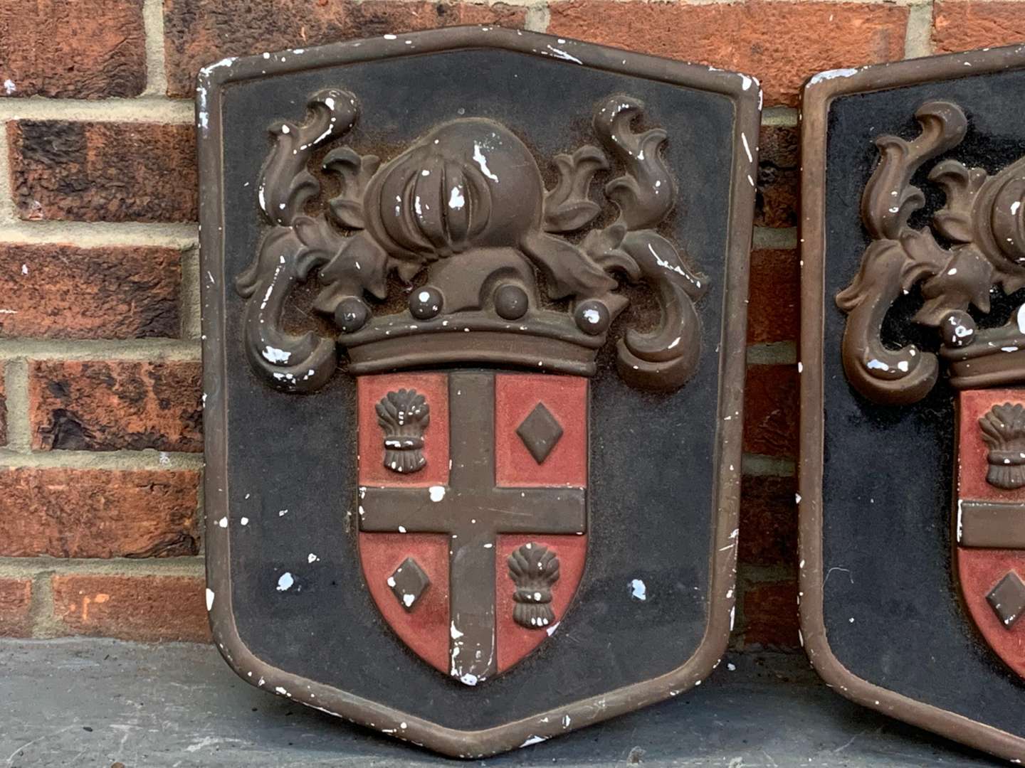 <p>Pair of Plaster Heraldic Crests a/f</p>