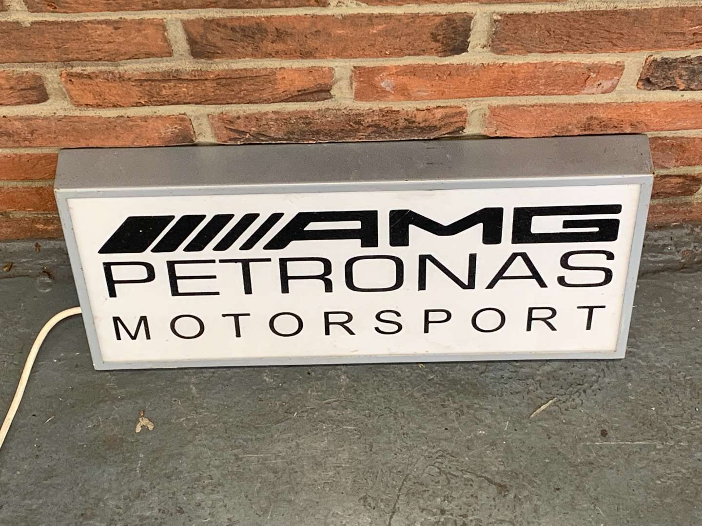 <p>AMG Petronas Motorsport Illuminated Sign</p>