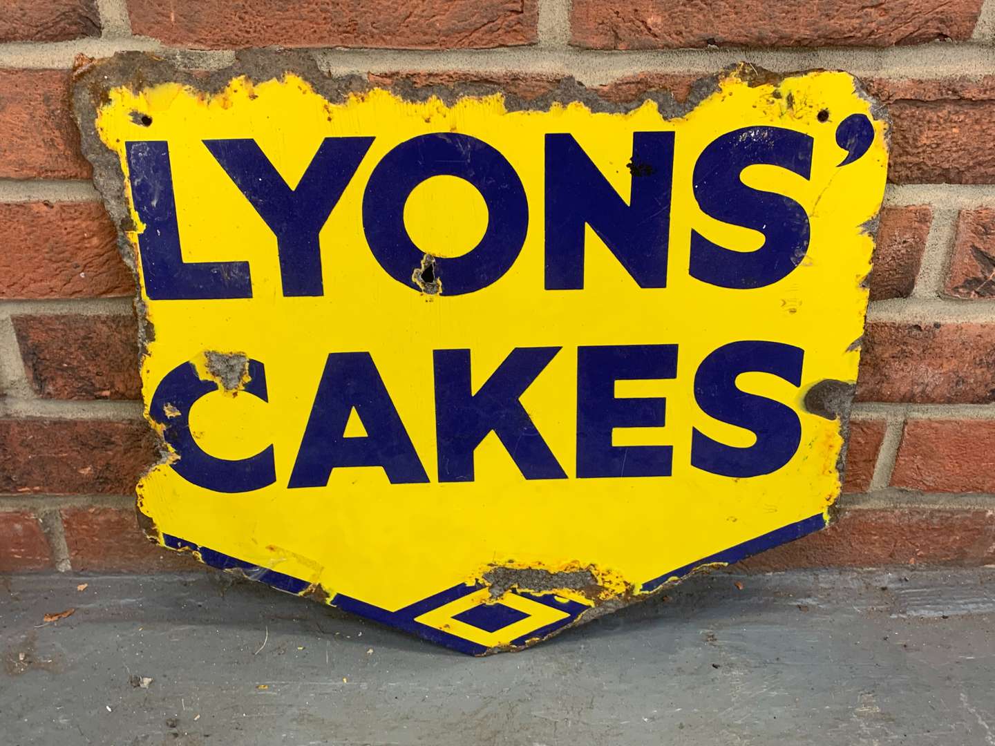 <p>Lyons Cake Enamel Sign</p>