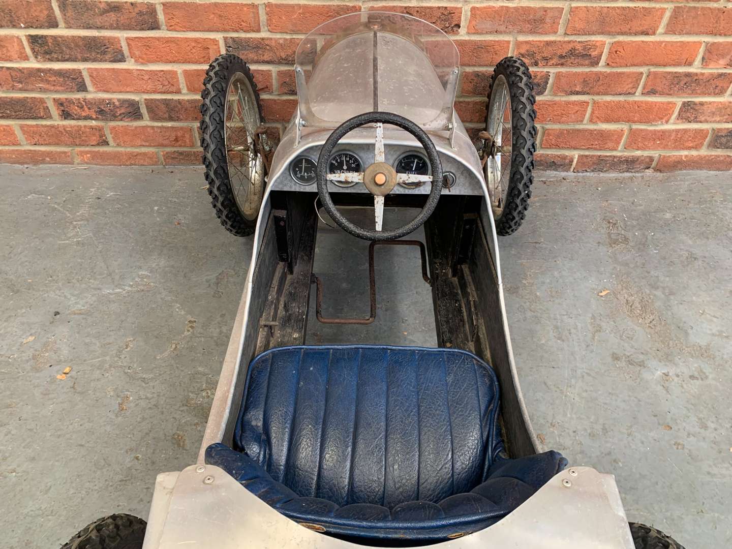 <p>Bugatti Styled Aluminium Bodied Made Child's Pedal Car</p>