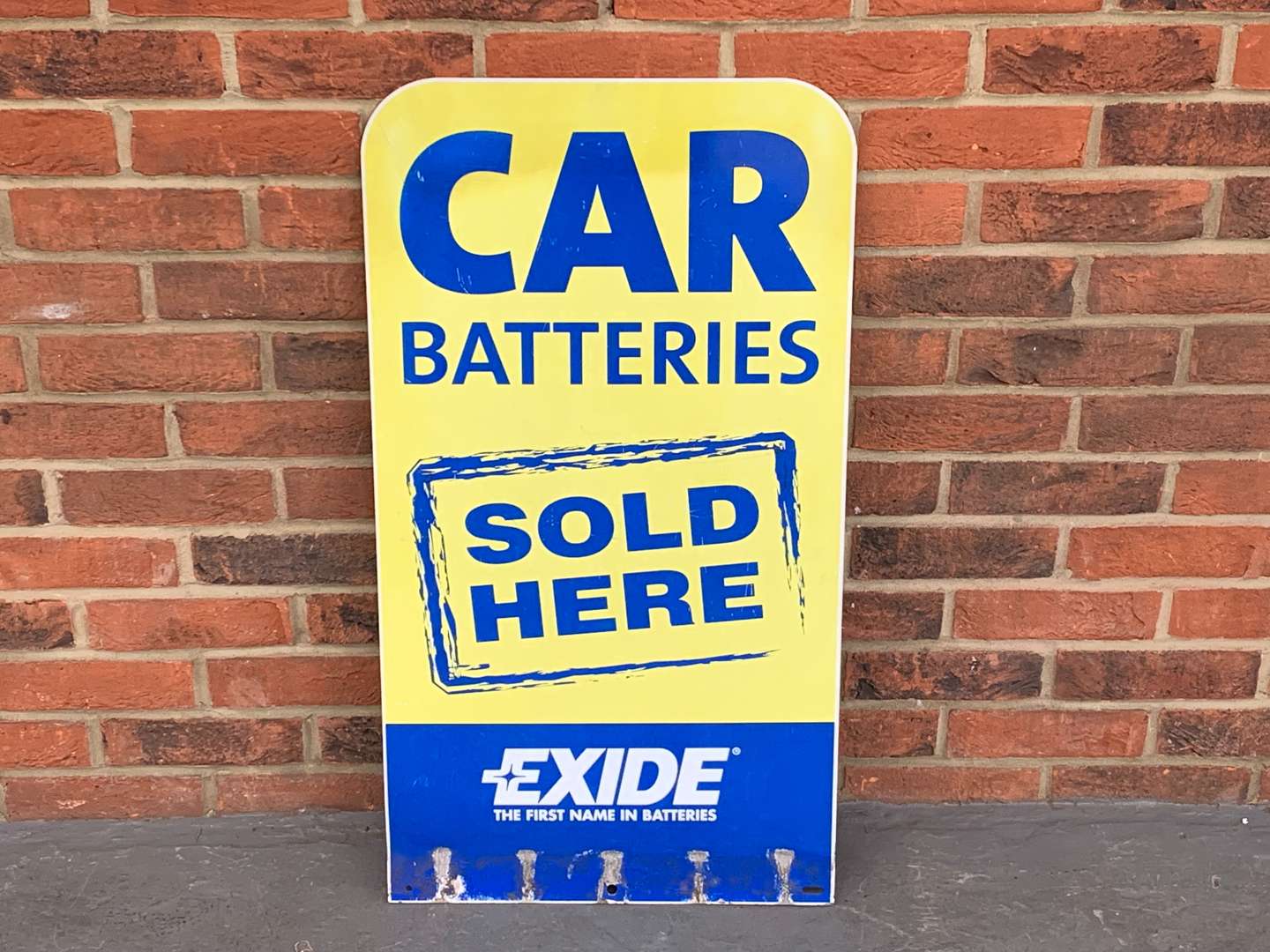 <p>Exide Car Batteries Sold Here Sign</p>