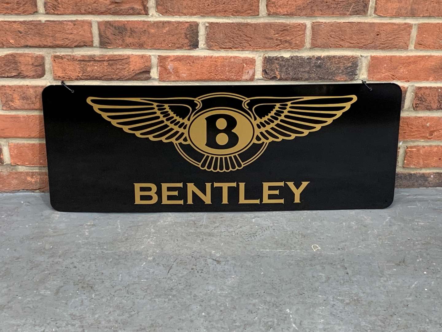 <p>Bentley Metal Hanging Sign</p>