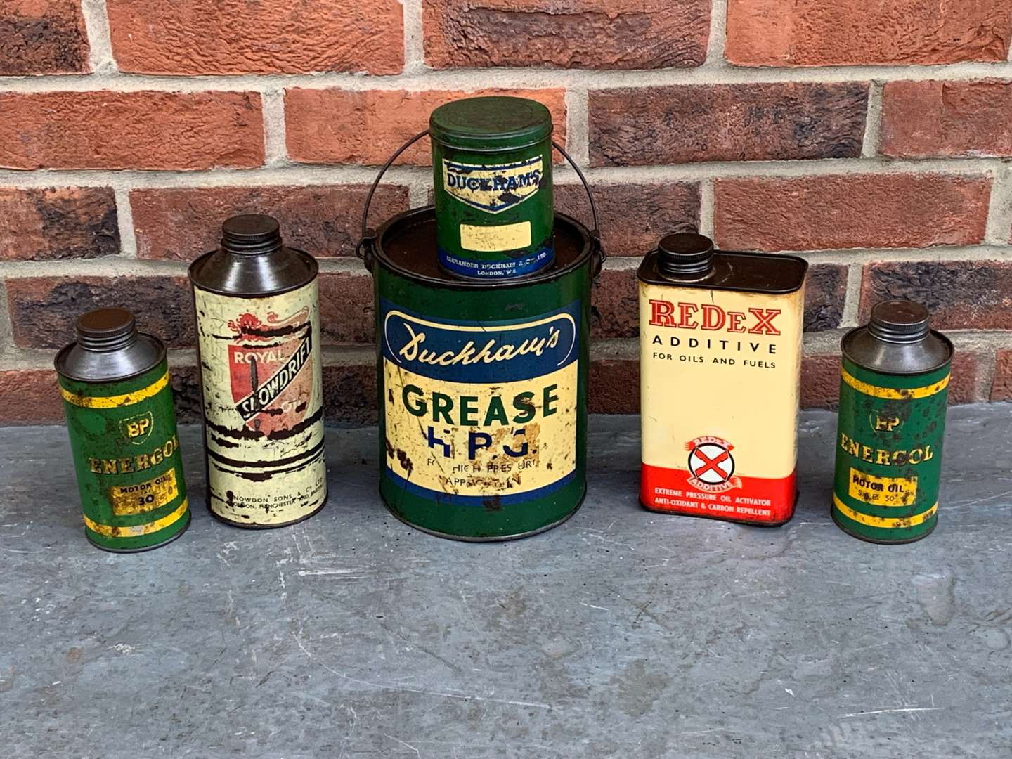 <p>Collection of Grease and Oil Tins</p>