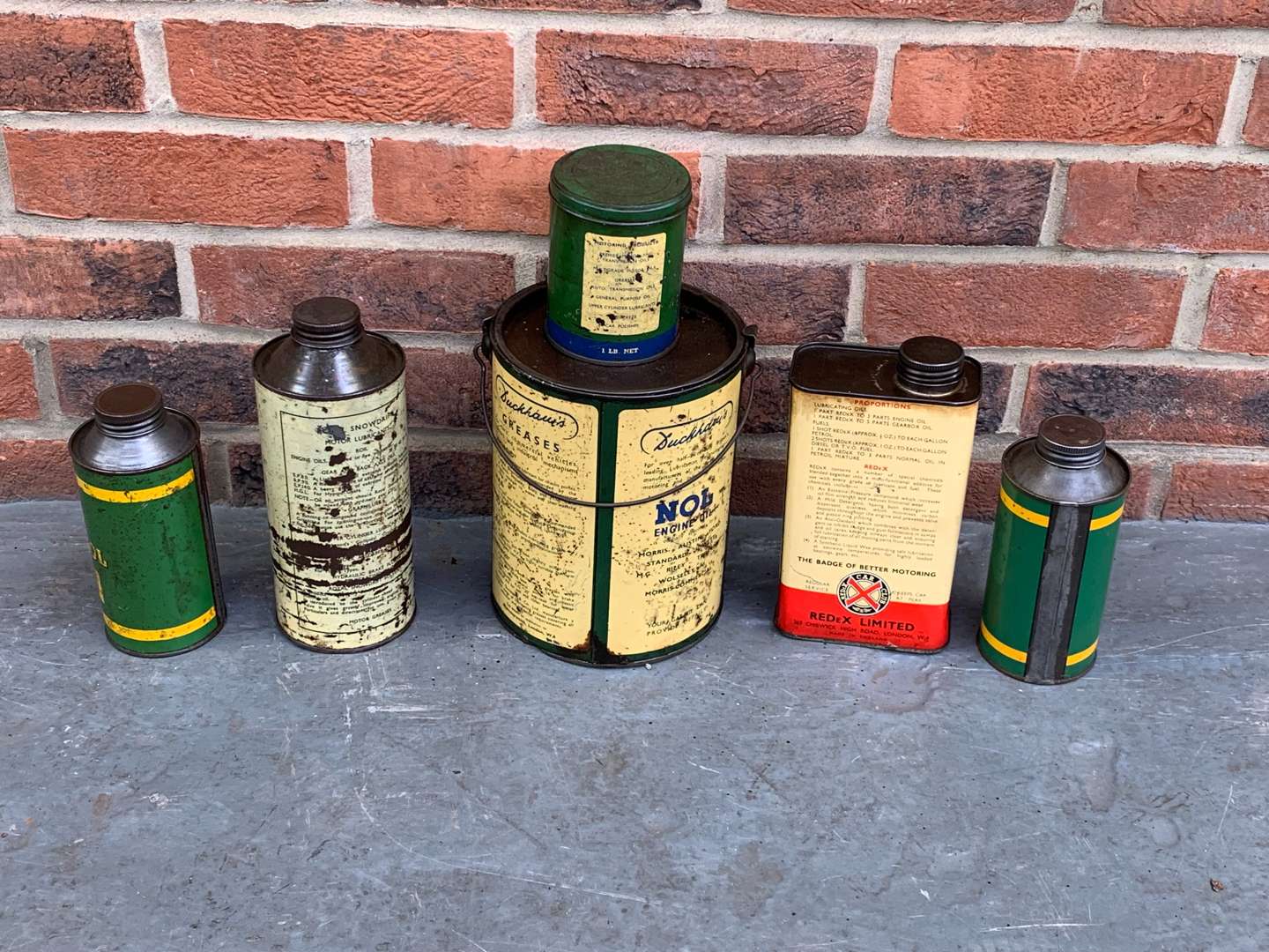 <p>Collection of Grease and Oil Tins</p>