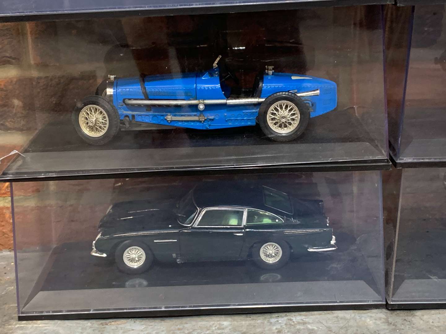 <p>Six 1:18 Scale Cased Model Cars</p>