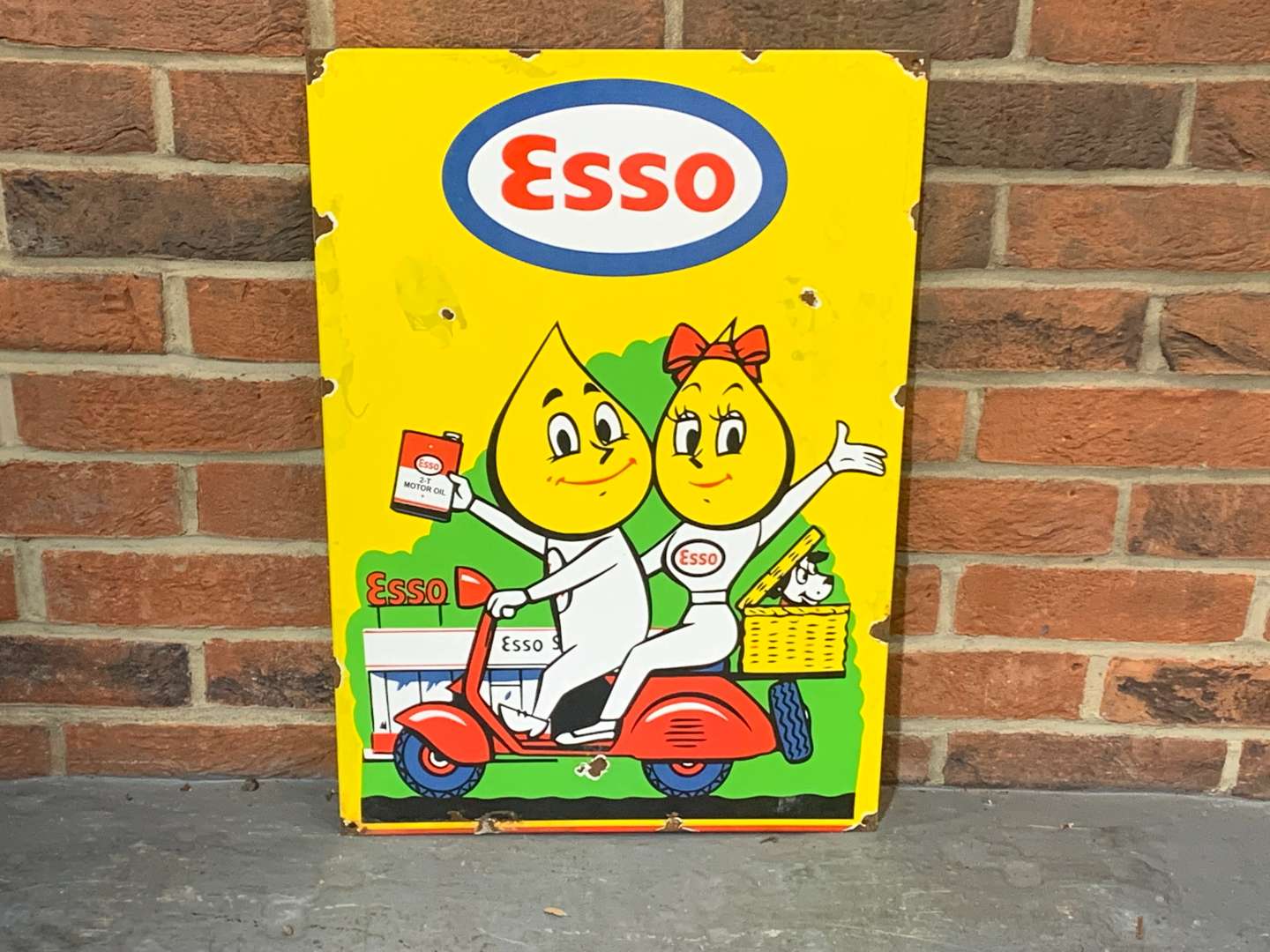 <p>Esso Mr and Mrs Drip Enamel Sign</p>