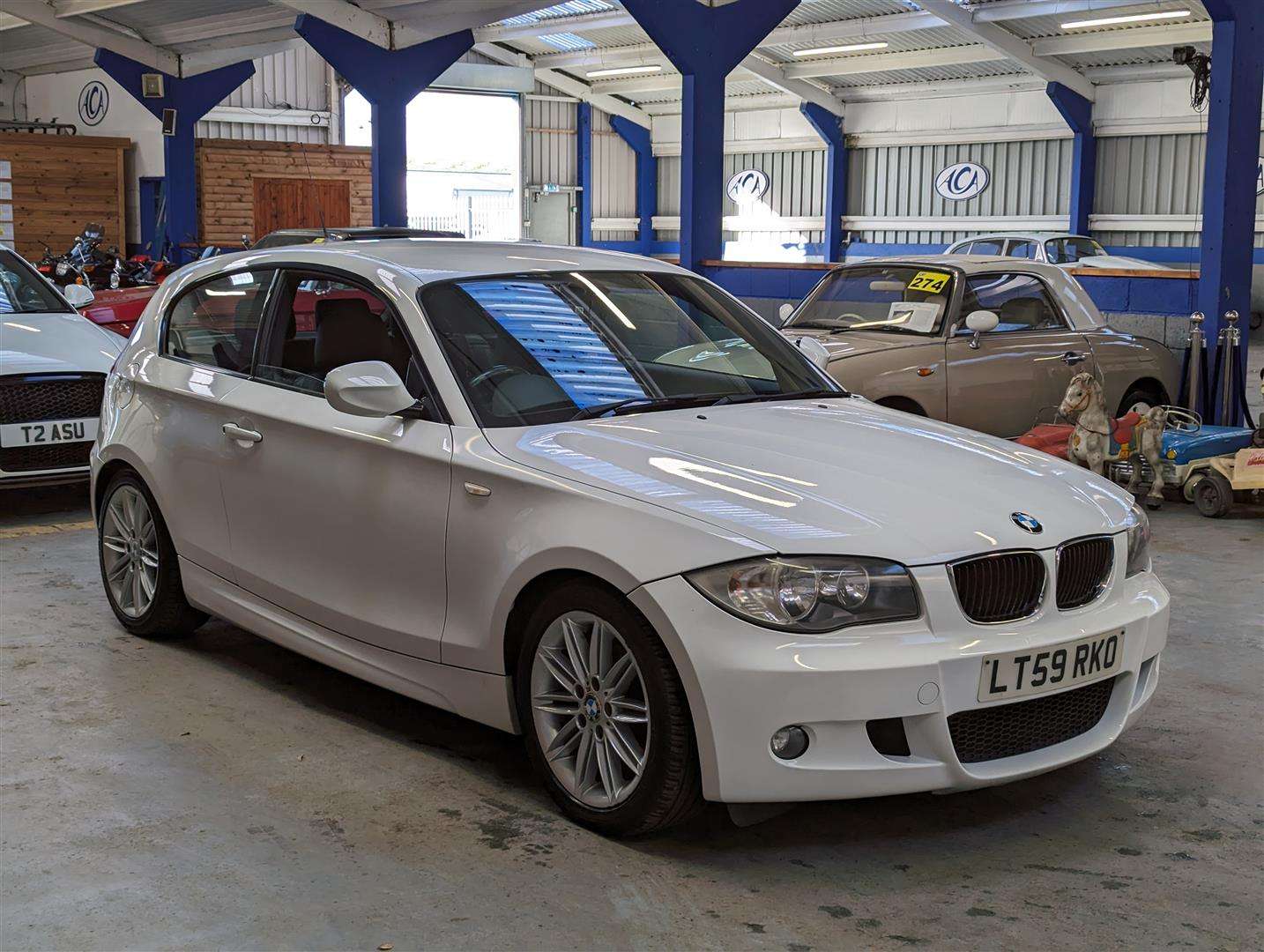 <p>2009 BMW 116I M SPORT</p>