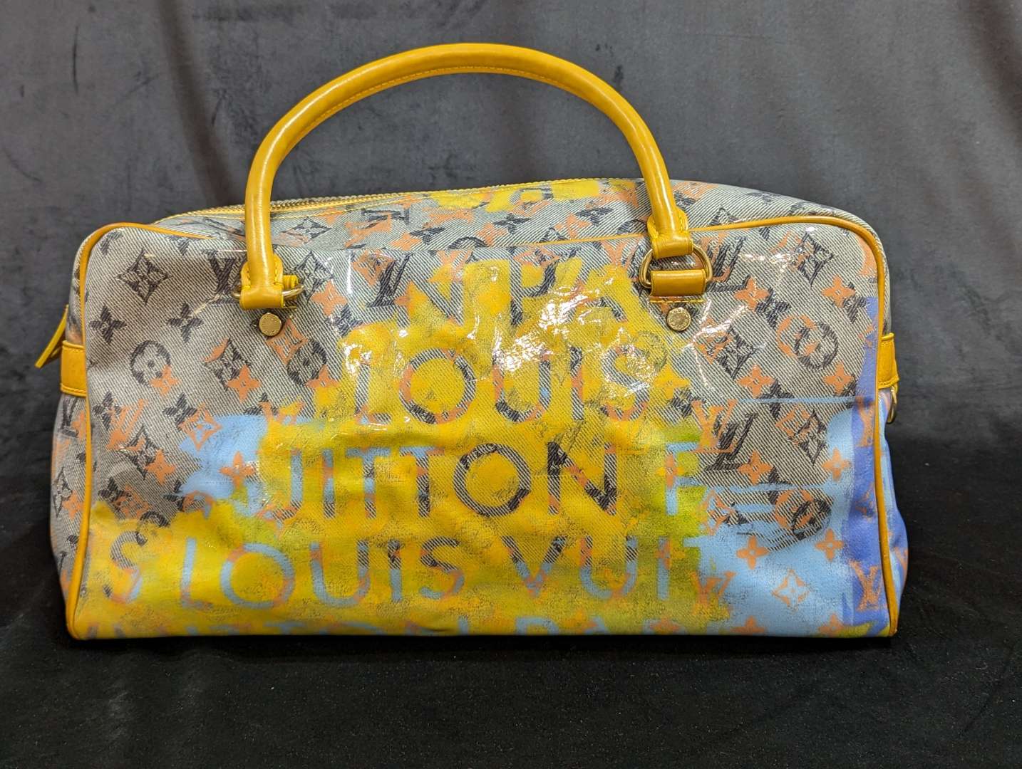 <p>Louis Vuitton pulp weekender bag</p>
