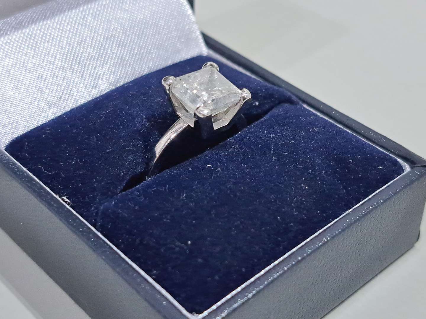 <p>14ct white gold solitaire claw set princess cut Diamond ring</p>