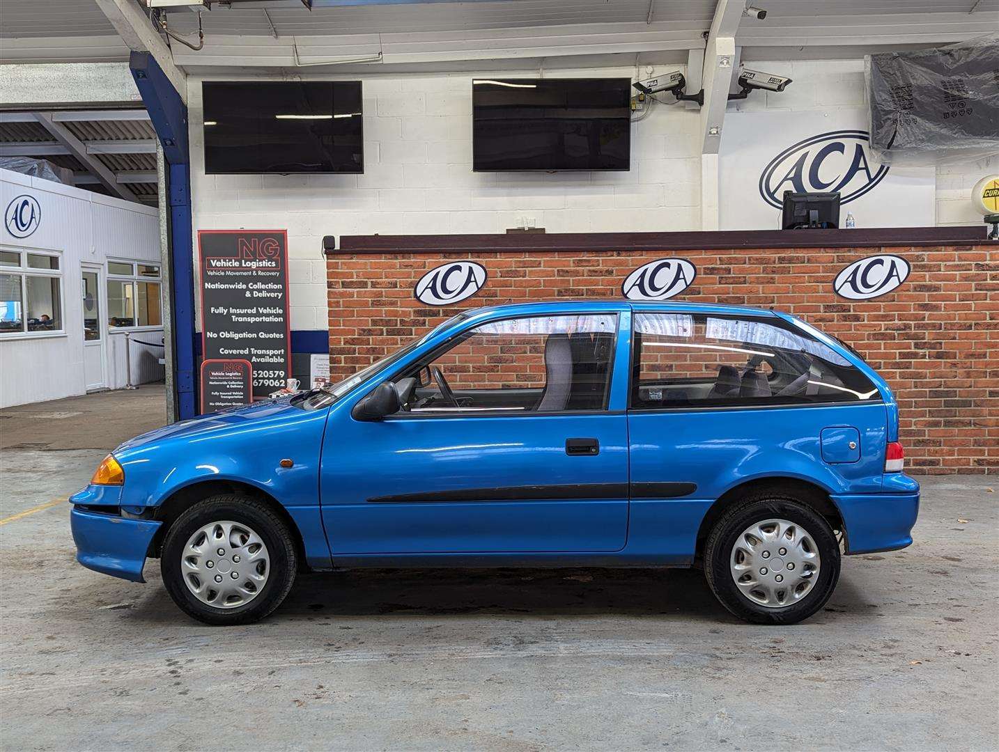 <p>2001 SUZUKI SWIFT GLS</p>