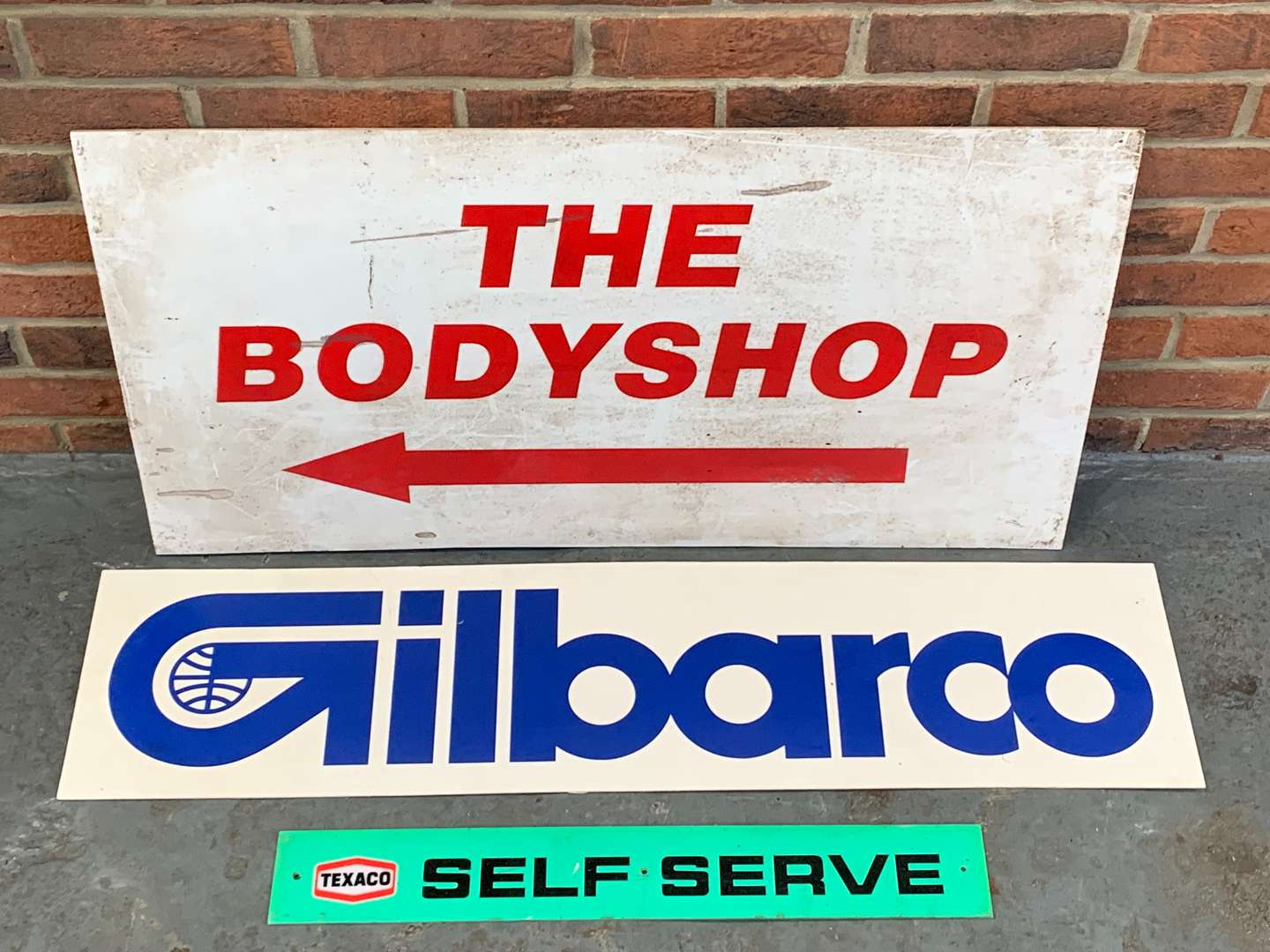 <p>Gilbaro, Bodyshop and Texaco Plastic Signs (3)</p>