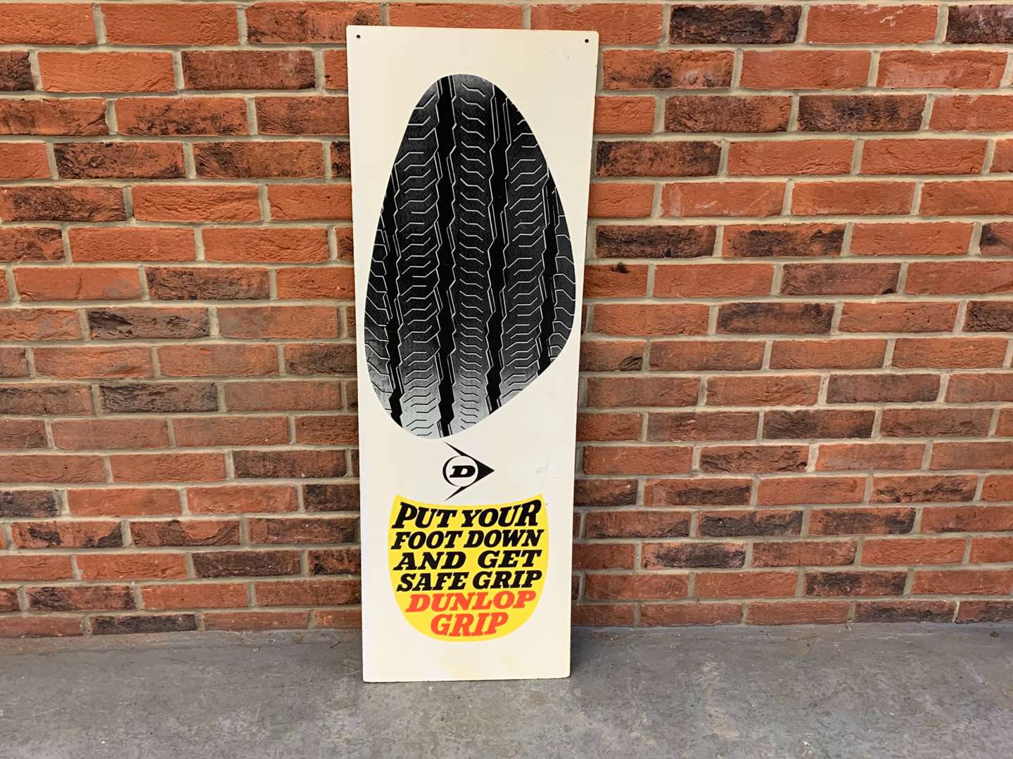<p>Dunlop Grip Tyre's Sign</p>