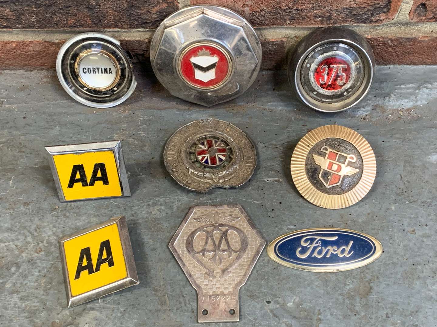 <p>Nine Classic Car Badges</p>