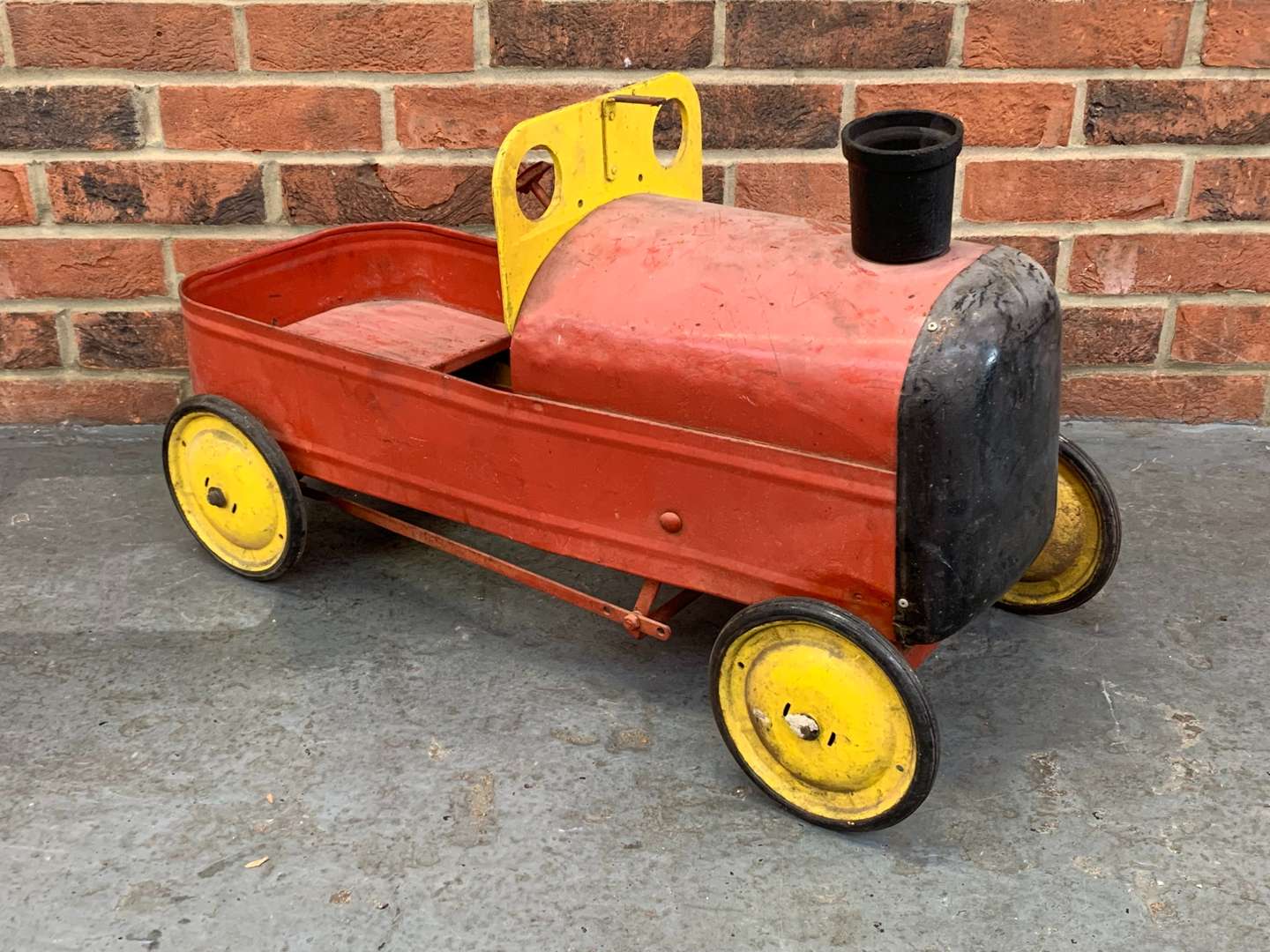 <p>Tin Plate Child's Pedal Train</p>