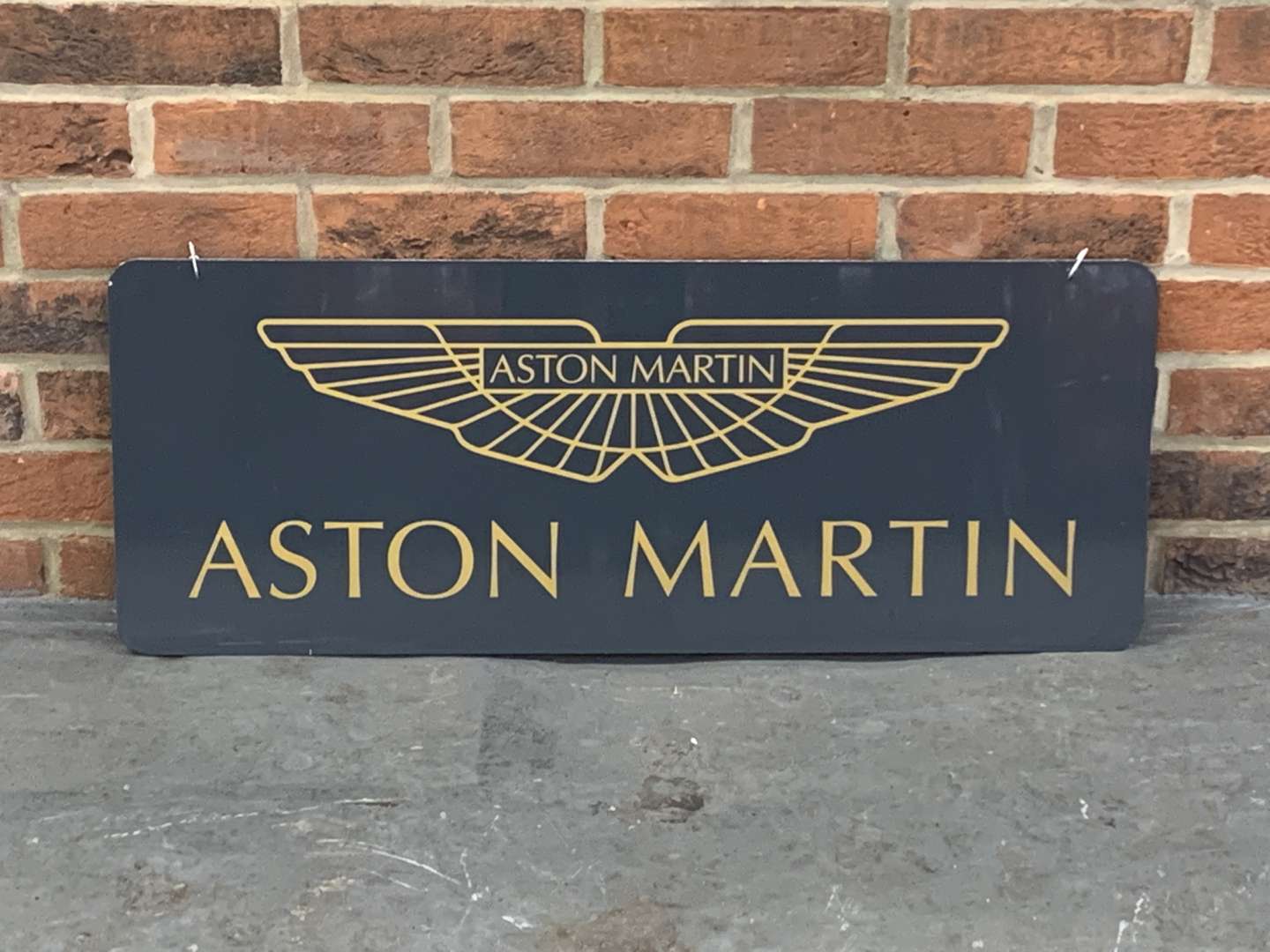 <p>Aston Martin Made Hanging Sign</p>