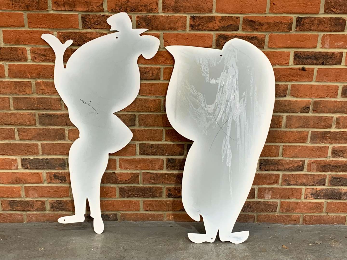 <p>Pair Of Large Metal Mr and Mrs Drips</p>